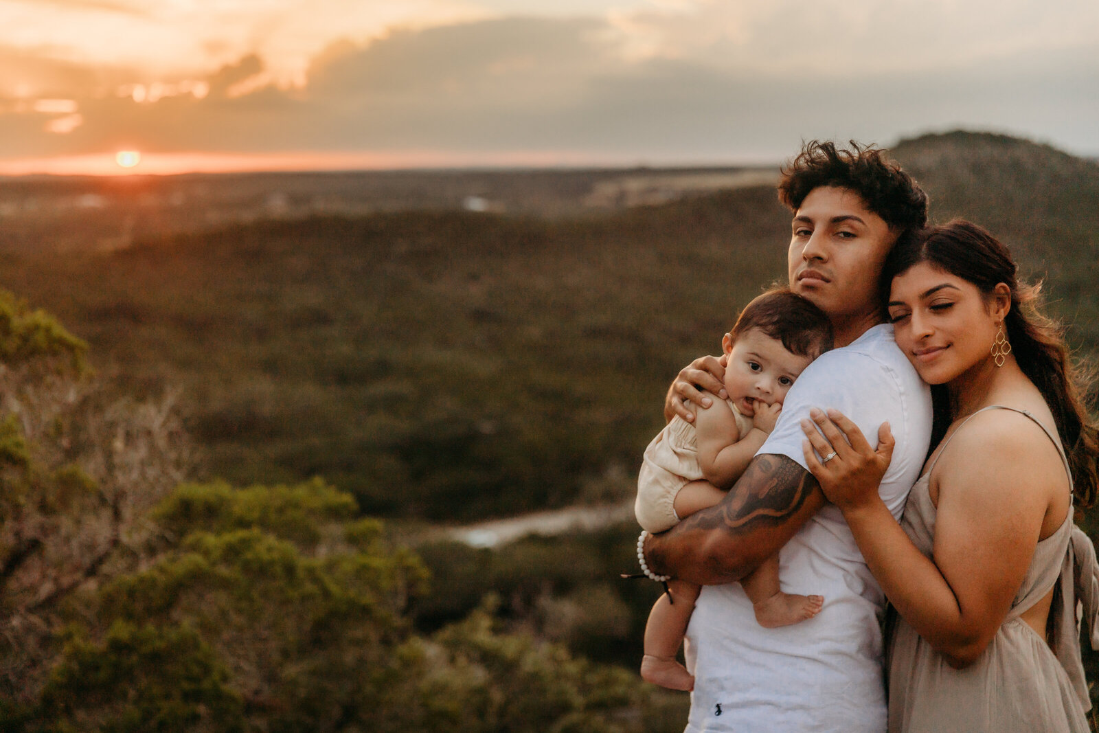 family-at-sunset-in-hills