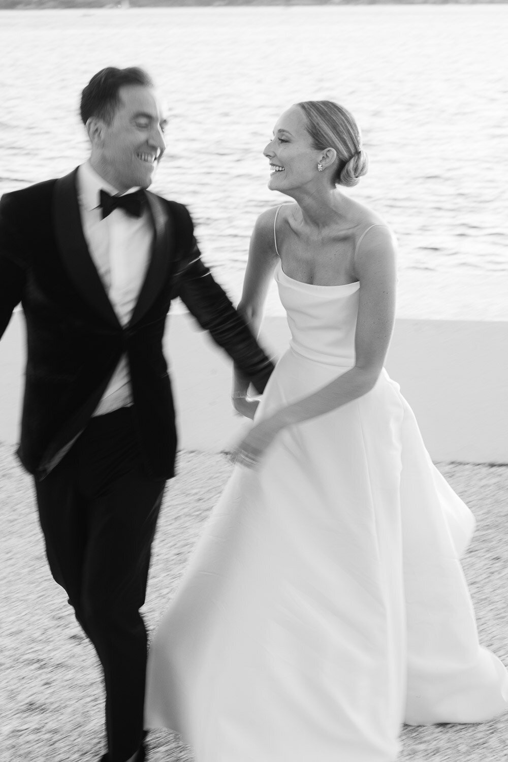 bride and groom motion by water