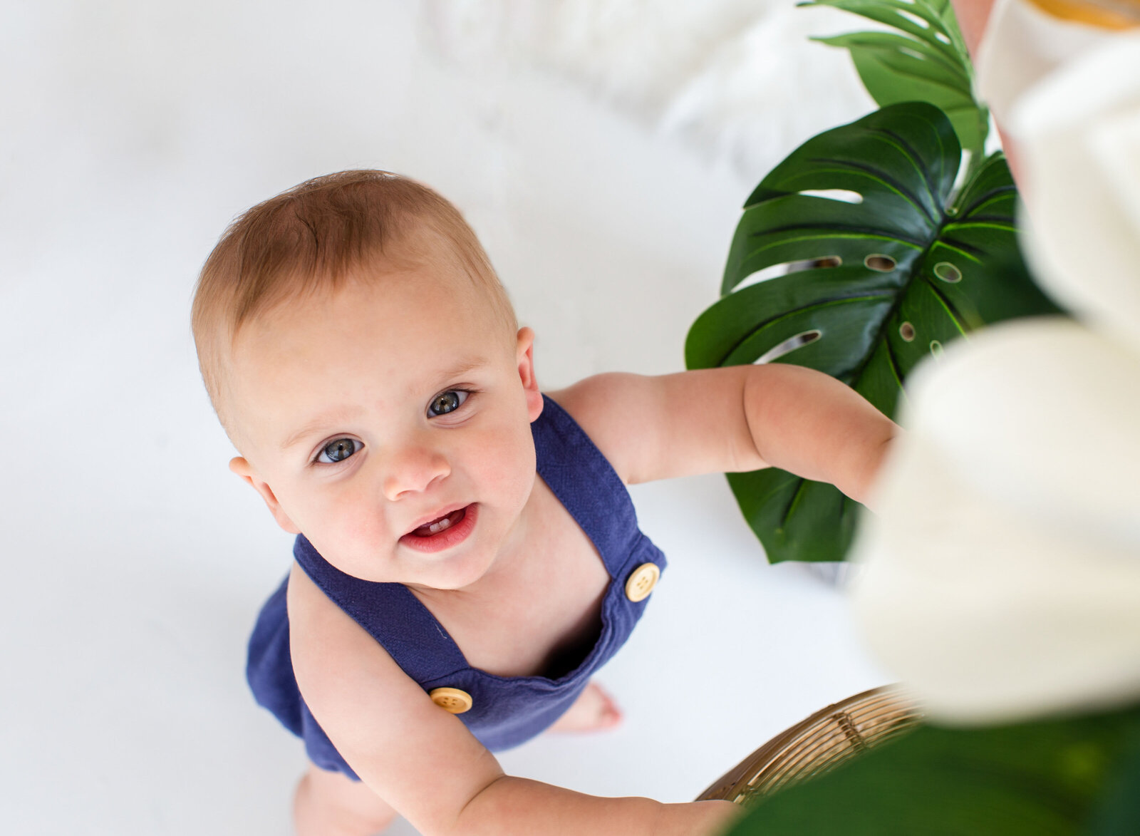 one year old boy smiling