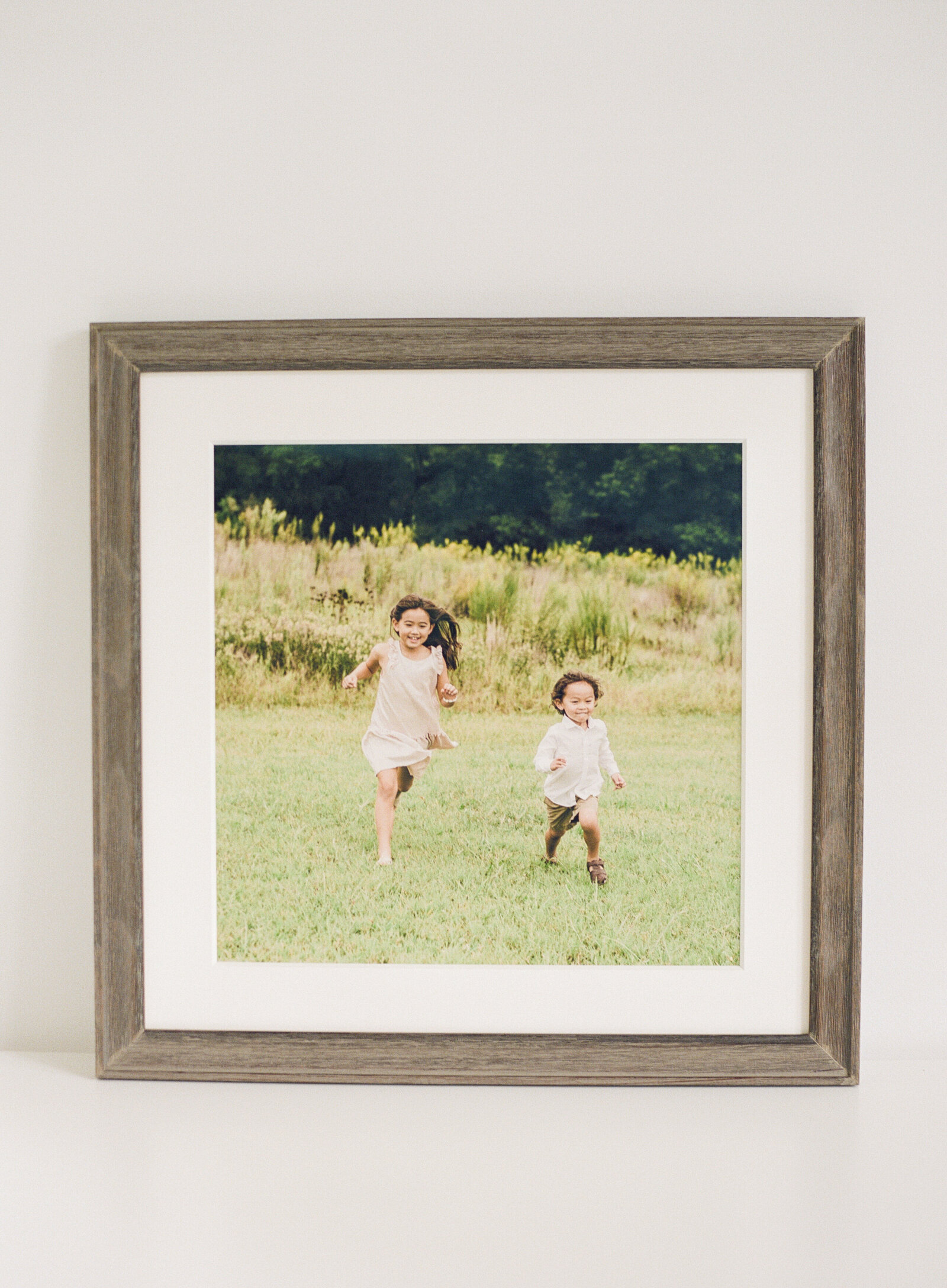 Framed wood portrait Photographed by Raleigh newborn photographers A.J. Dunlap Photography.