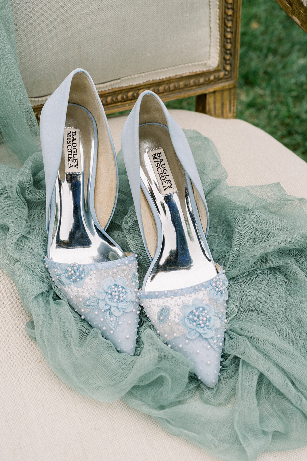 Luxury Bridal Shoes on Soft Blue Fabric at Sunstone Winery