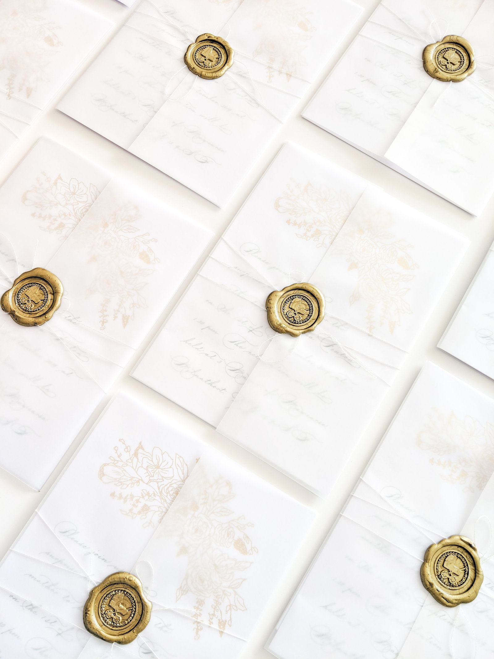 Wax seal and vellum wraps around Scottish wedding invitations