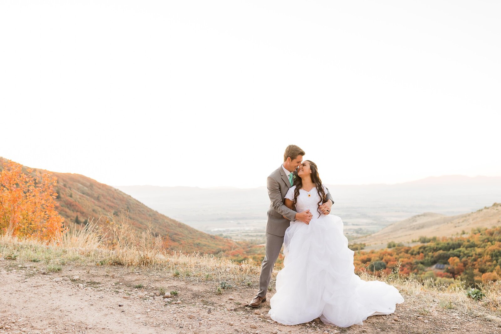 Cherry Peak ski resort wedding venue and canyon makes a beautiful backdrop for wedding photos.
