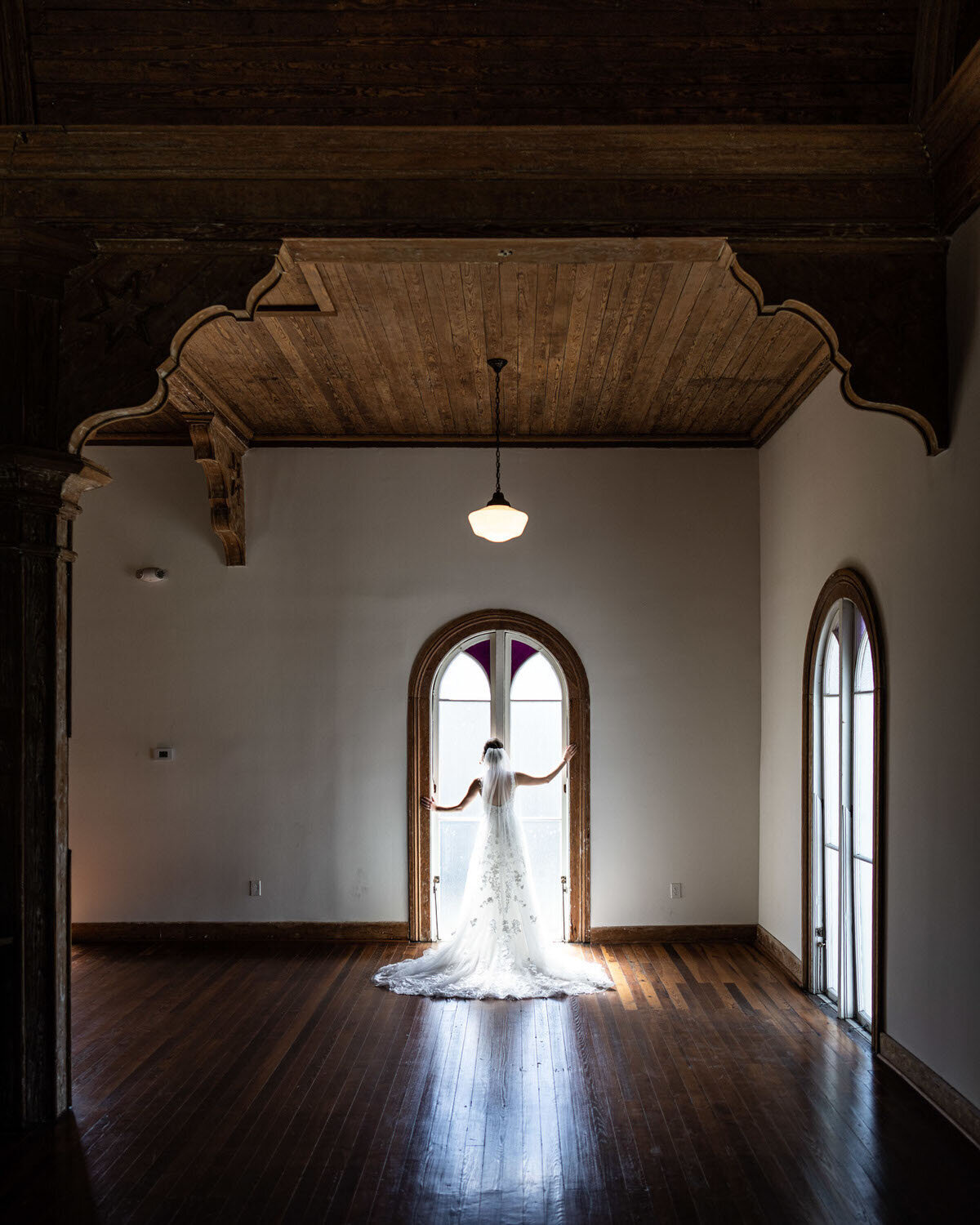 livaudais-hall-bride-in-window-4x5