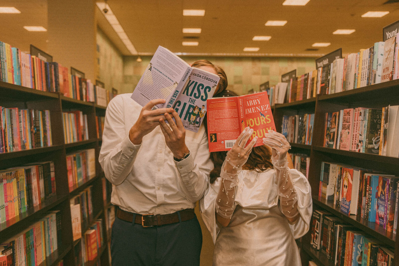 Bride and groom at bookstore by Boise Idaho wedding photographer