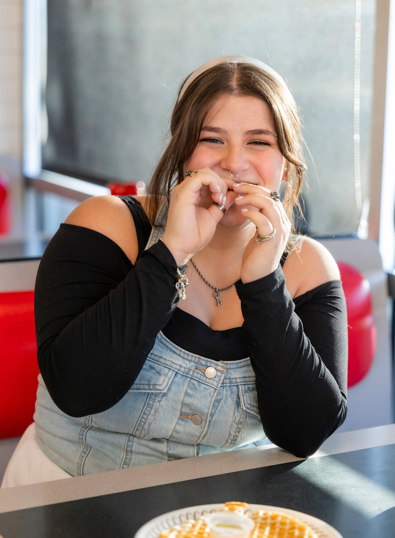 girl eating bacon