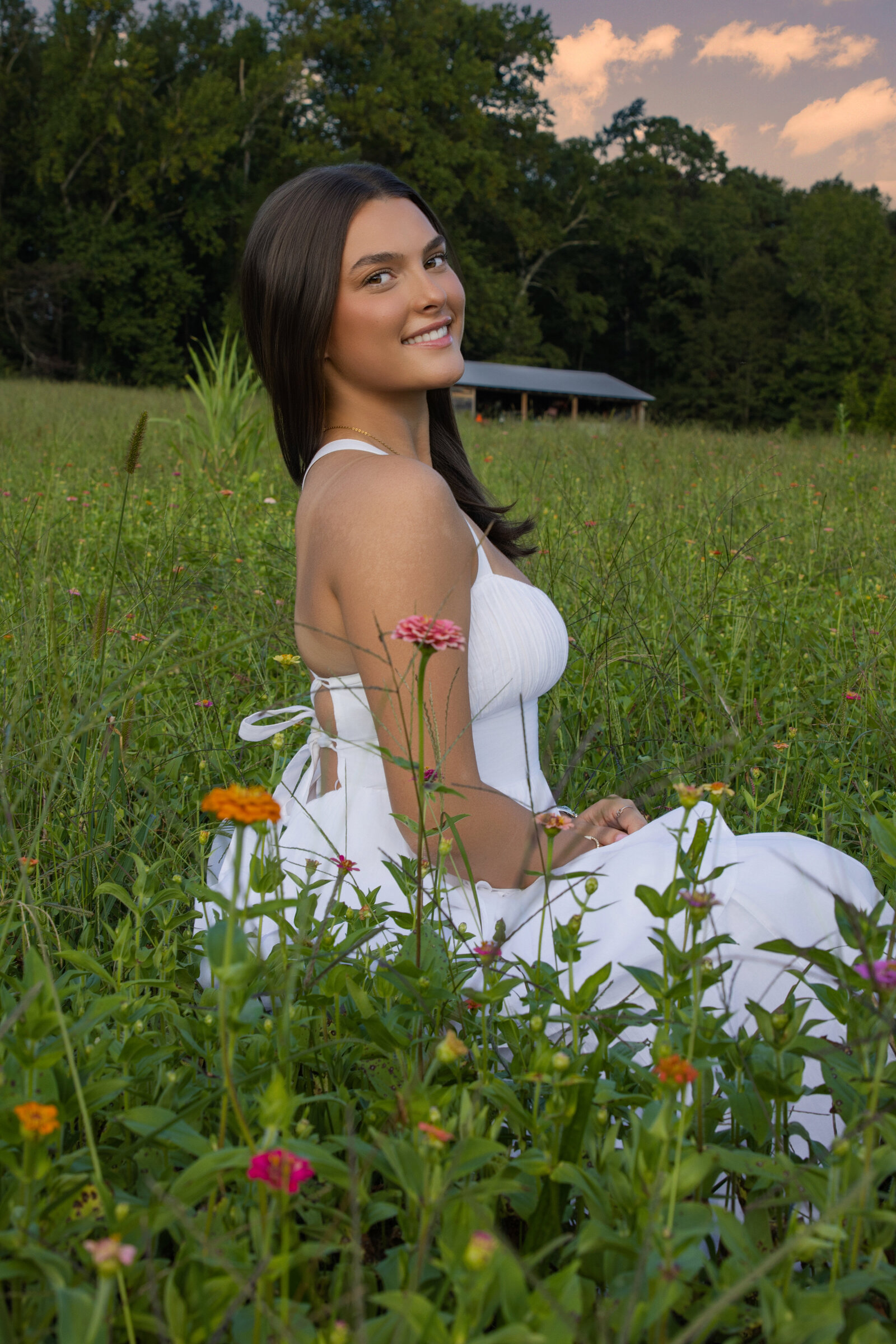 Atlanta High School Senior in wildflower fields in Atlanta, Georgia with white sundress