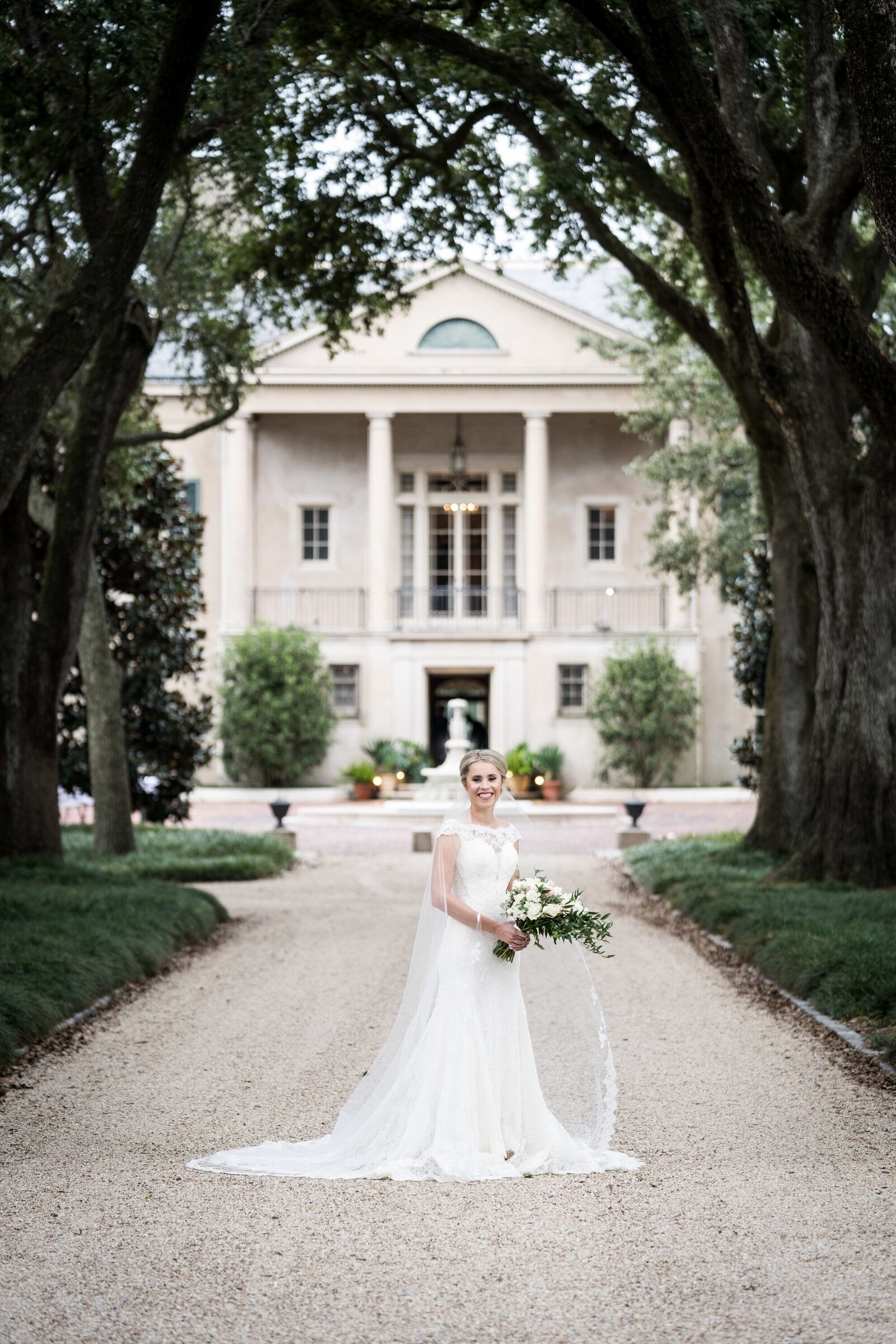 Bride in front of Longue Vue House and Gardens in New Orleans