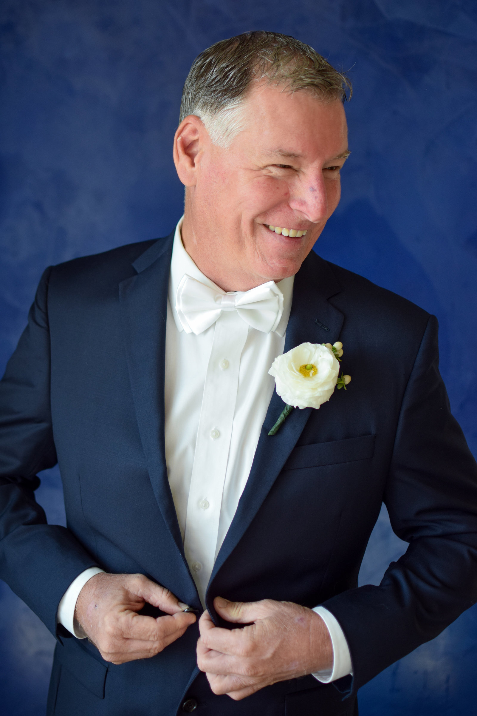 Wedding Groom Portrait Navy Suit White Ranunculus Buttoning Jacket One Ocean Resort Jacksonville Florida