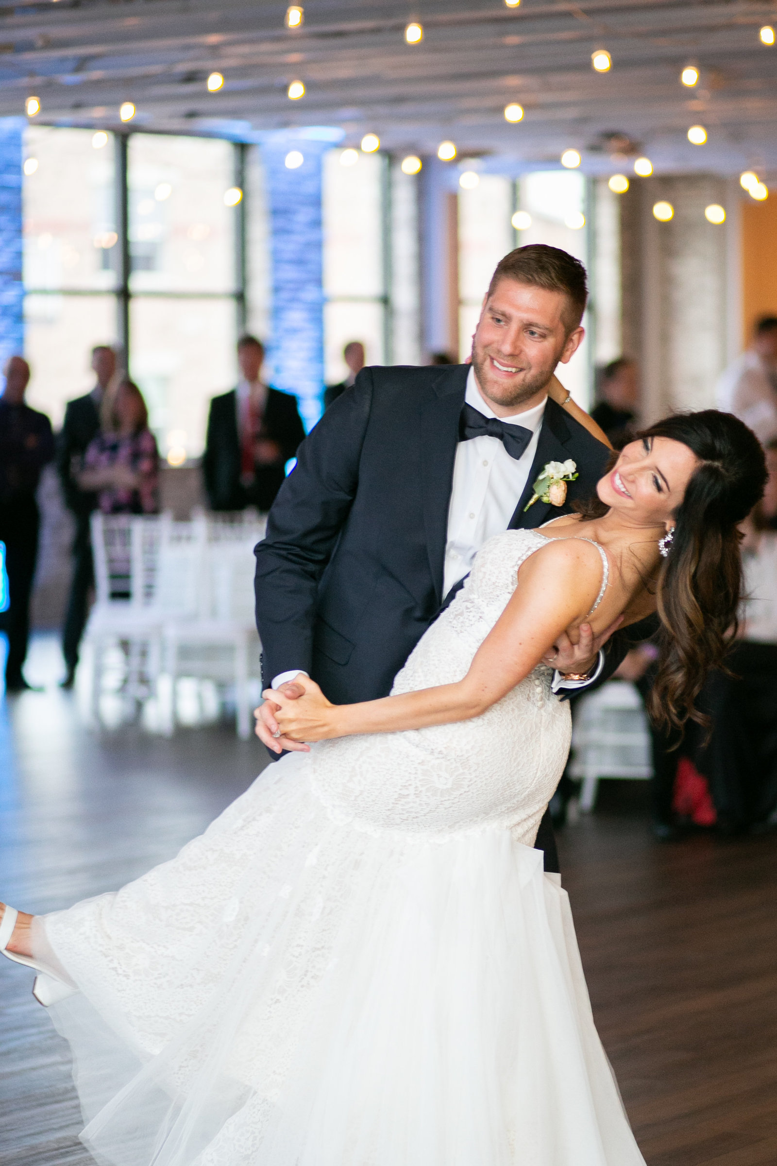 Husband dipping a wife for a dance