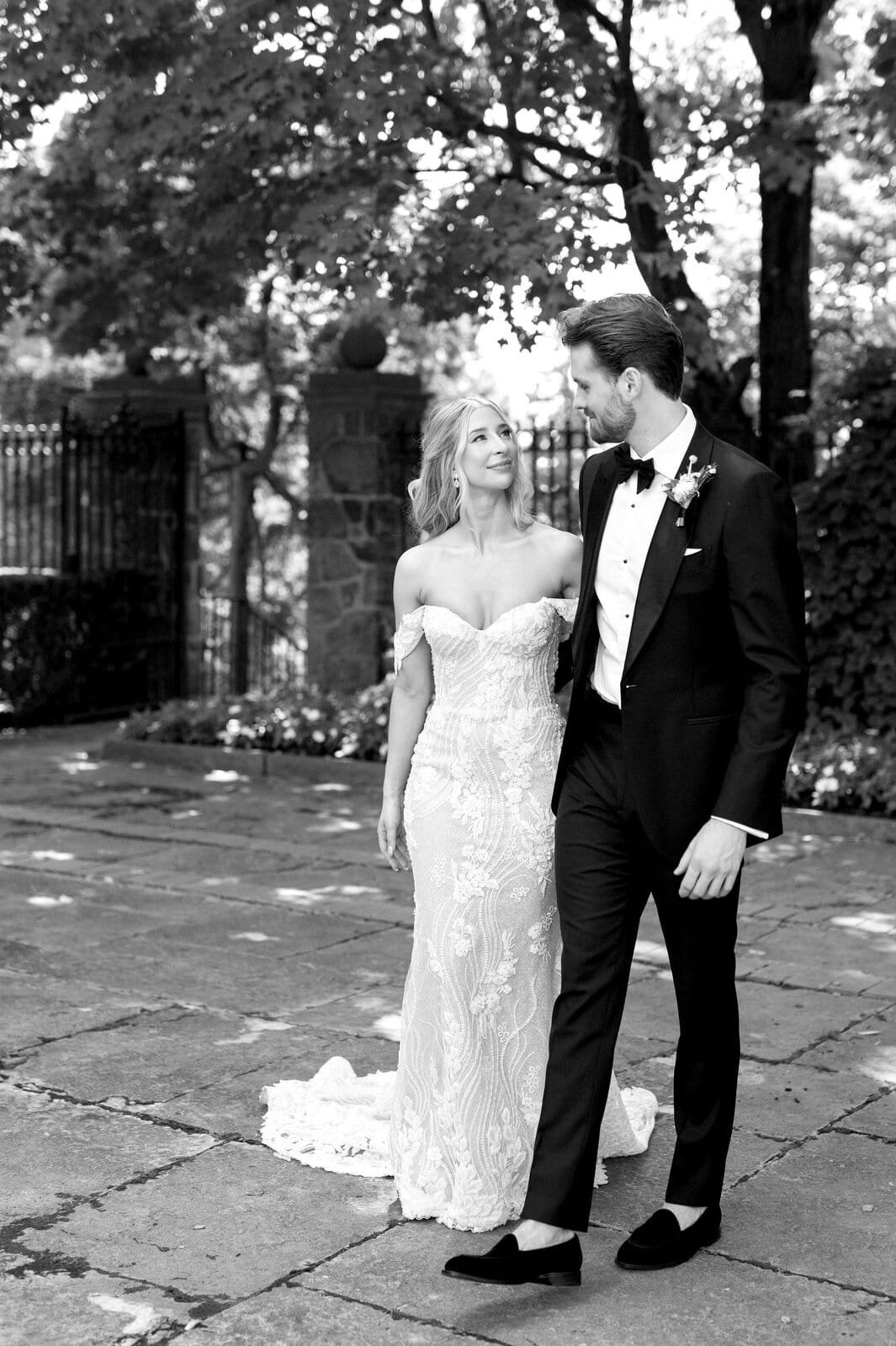 Bride and Groom Walking Editorial Portraits at Graydon Hall Manor Toronto Wedding Photographer Jacqueline James Photography
