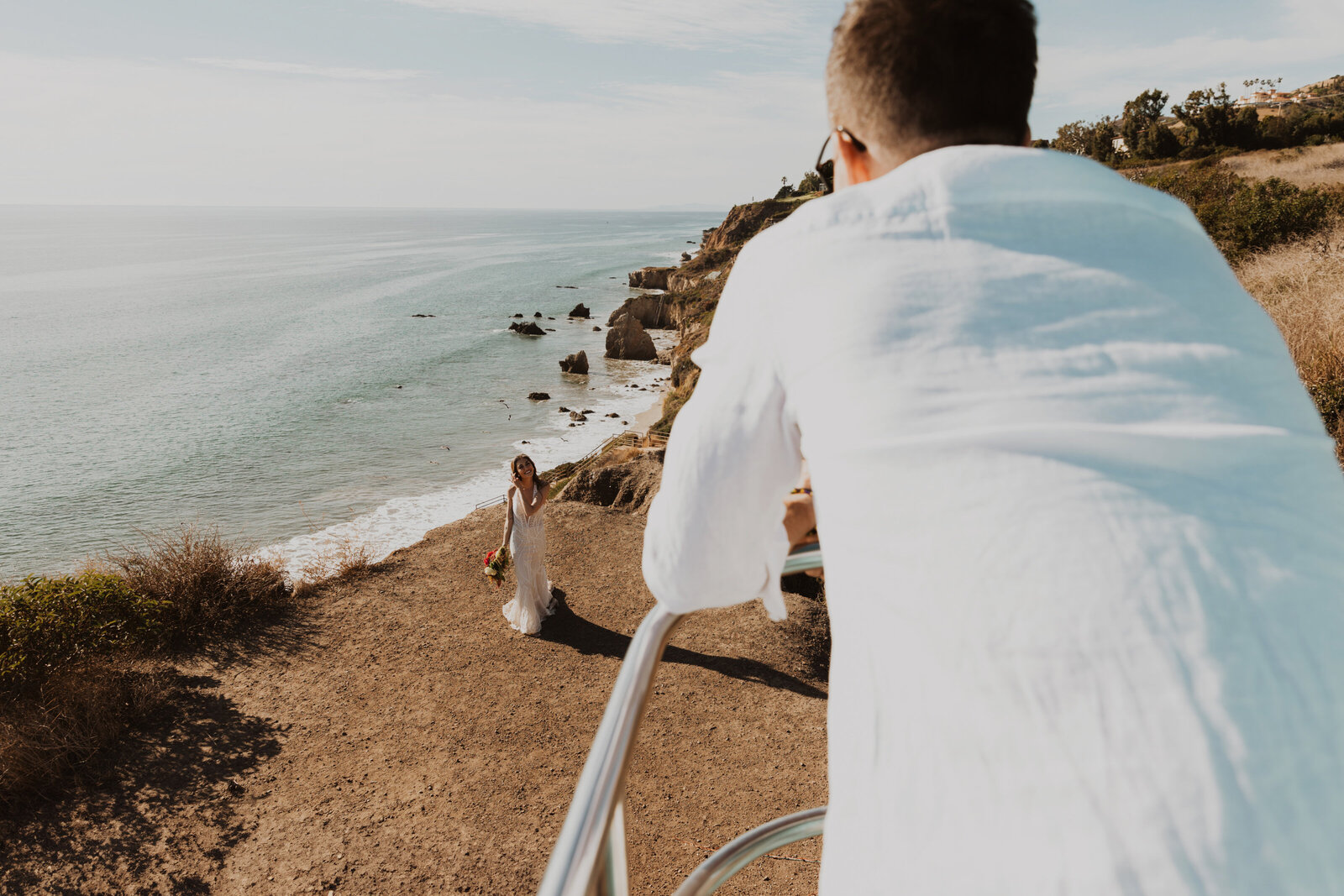 El Matador Beach elopement: An unforgettable adventure for free-spirited couples. Raw emotion and epic scenery in vibrant color