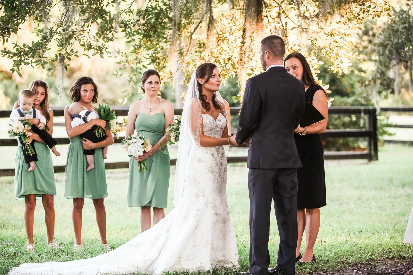 Bride and groom exchange vows, Boone Hall Plantation, Charleston, South Carolina