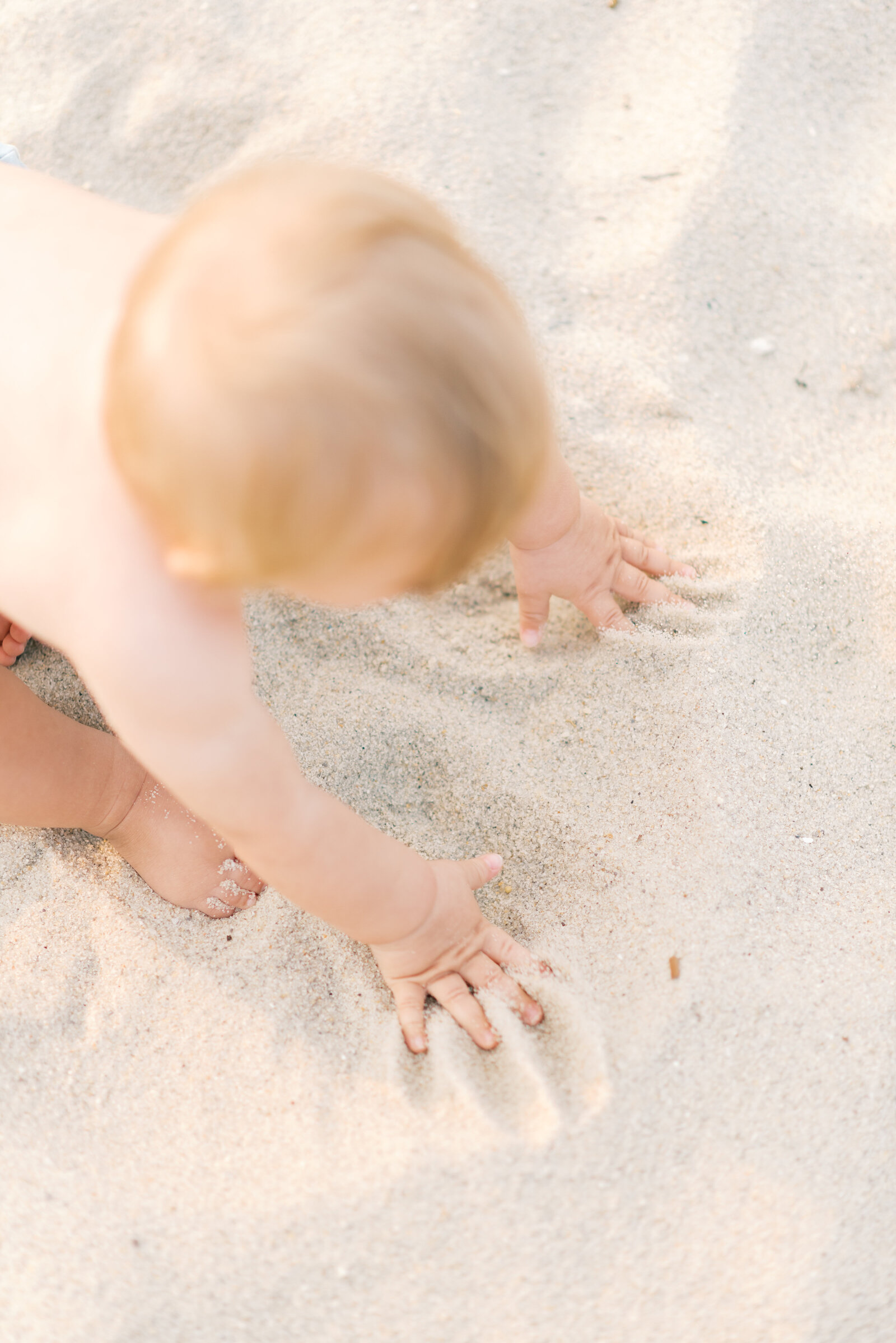 baby-playing-in-sand-virginia-beach
