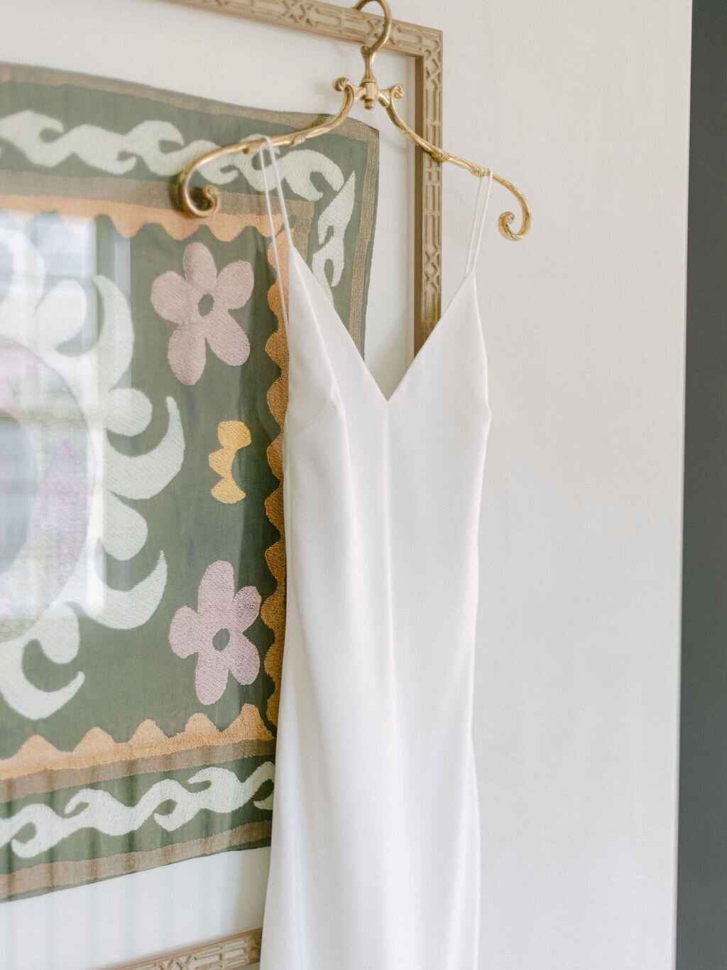 Simple wedding dress  on hanger for destination wedding at Rosemary beach florida