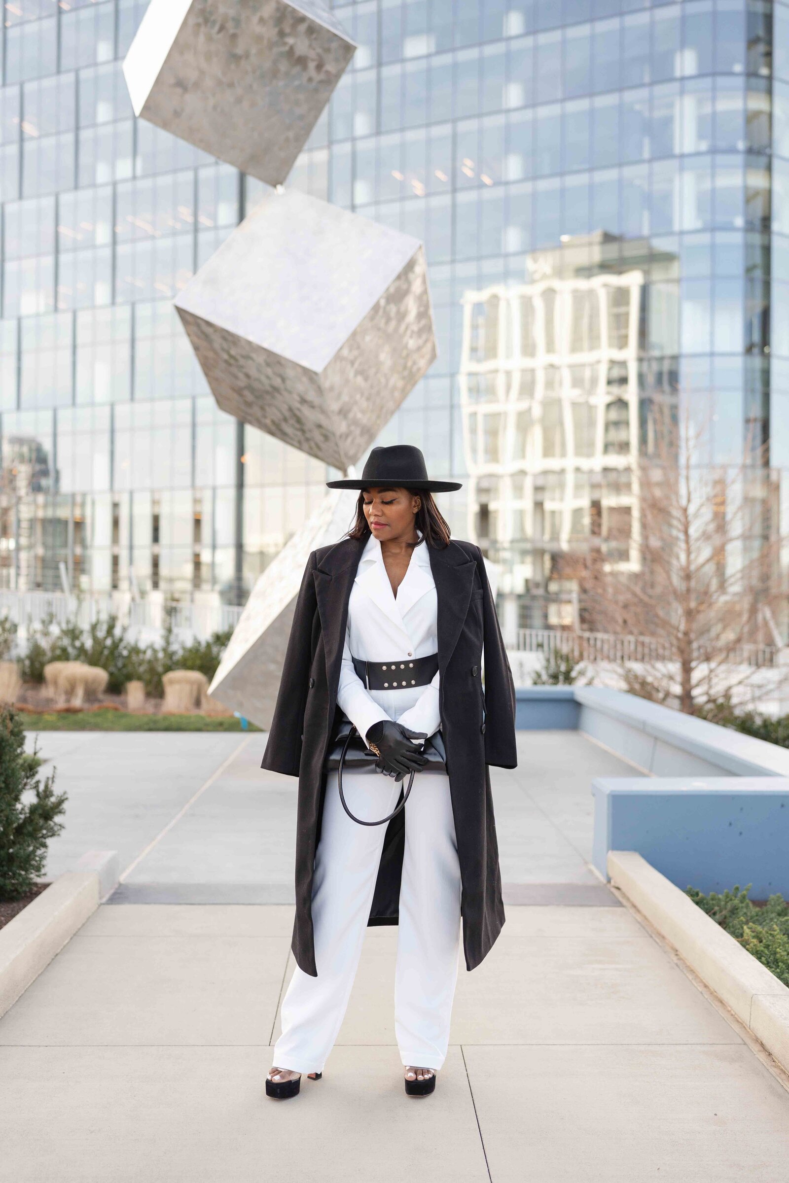 model wearing coat over jumpsuit taken by Haymarket,VA product photographer