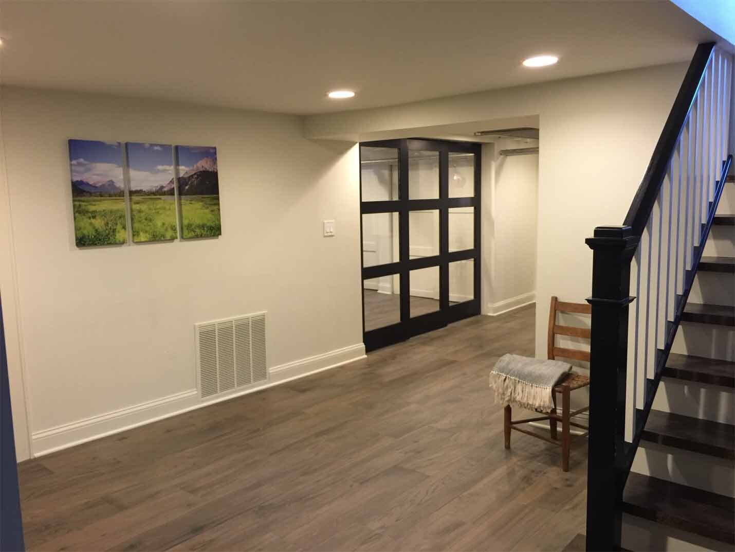 Modern basement design with hardwood floors