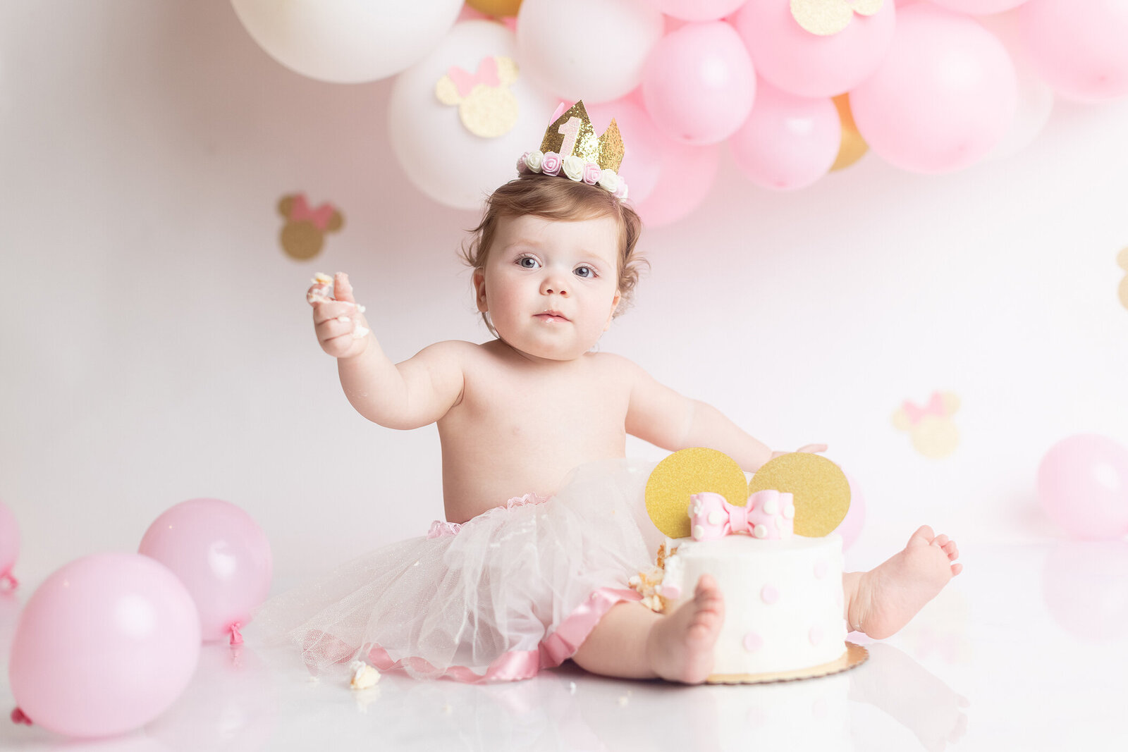 Pink Minnie Mouse cake smash with Dahlias and Daisies Photography.