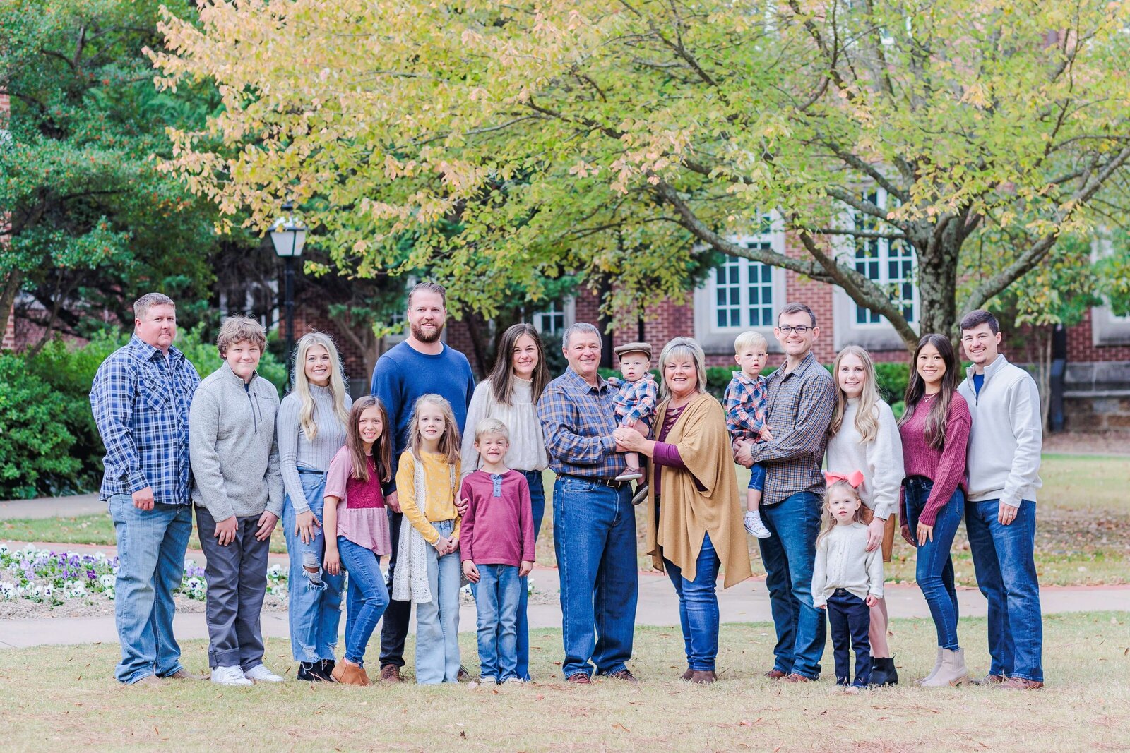 a large family poses for a photo