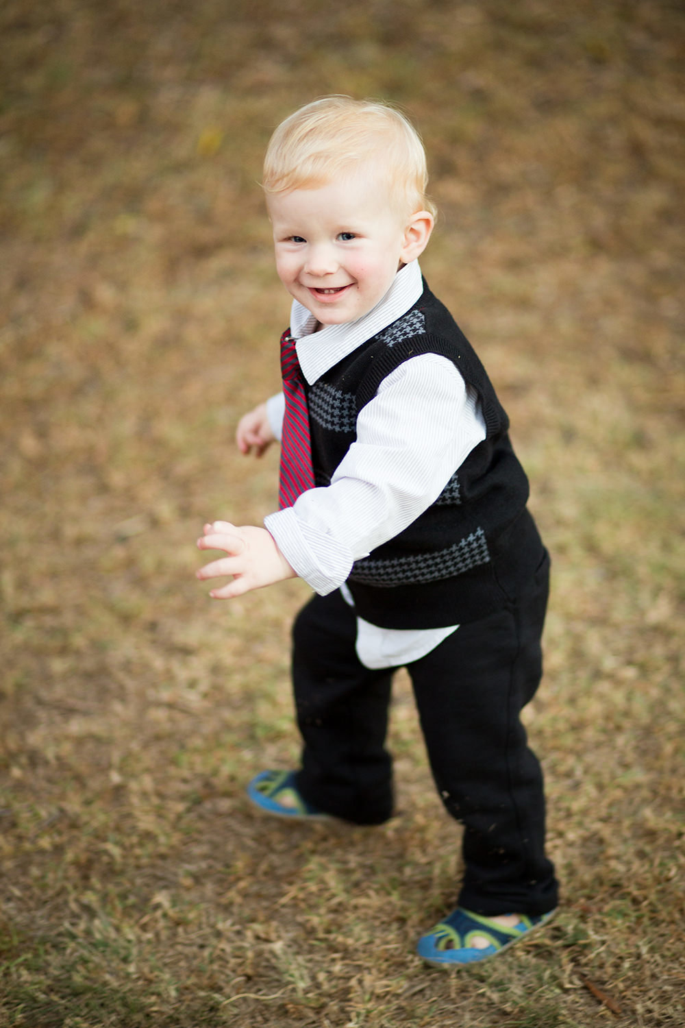 san diego family photographer | little boy running and laughing at the camera