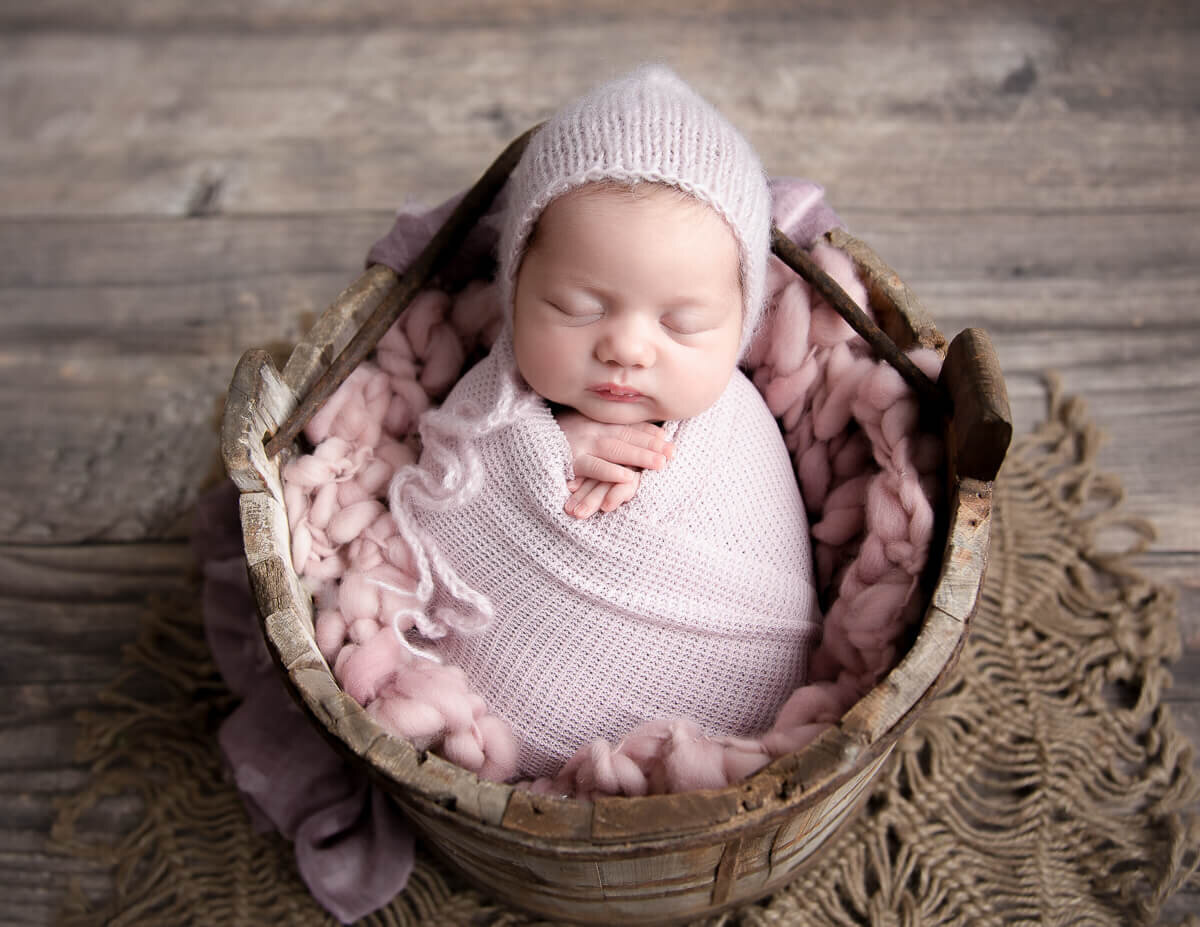 Sleeping newborn posed at our studio located in Rochester, NY.