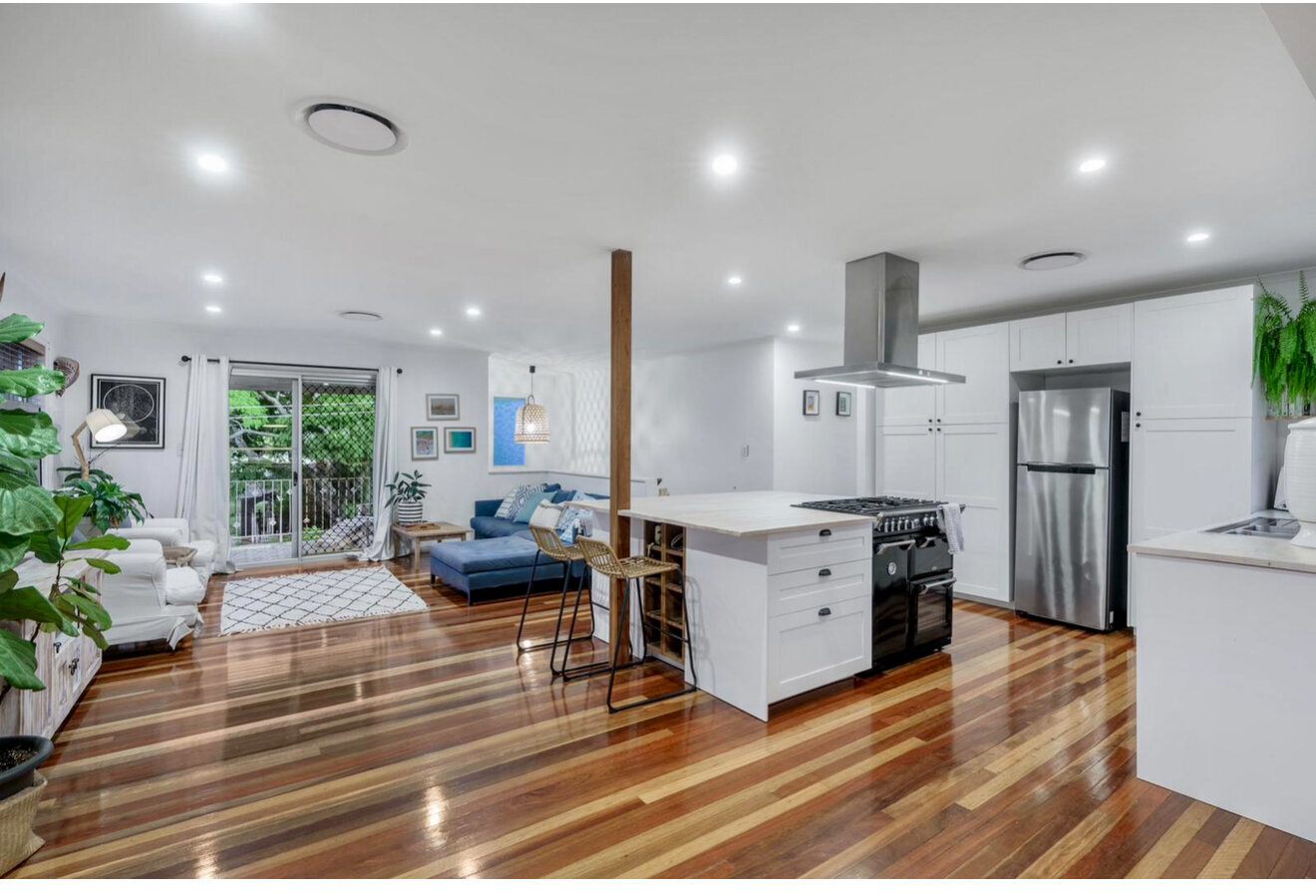 Modern kitchen and living room lighting installed by Captis Creations in Perth home