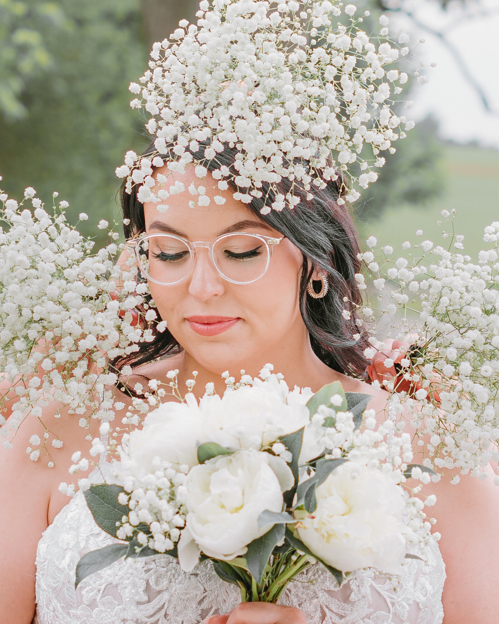 Bride with ring of flowers around her head at the Farmstead