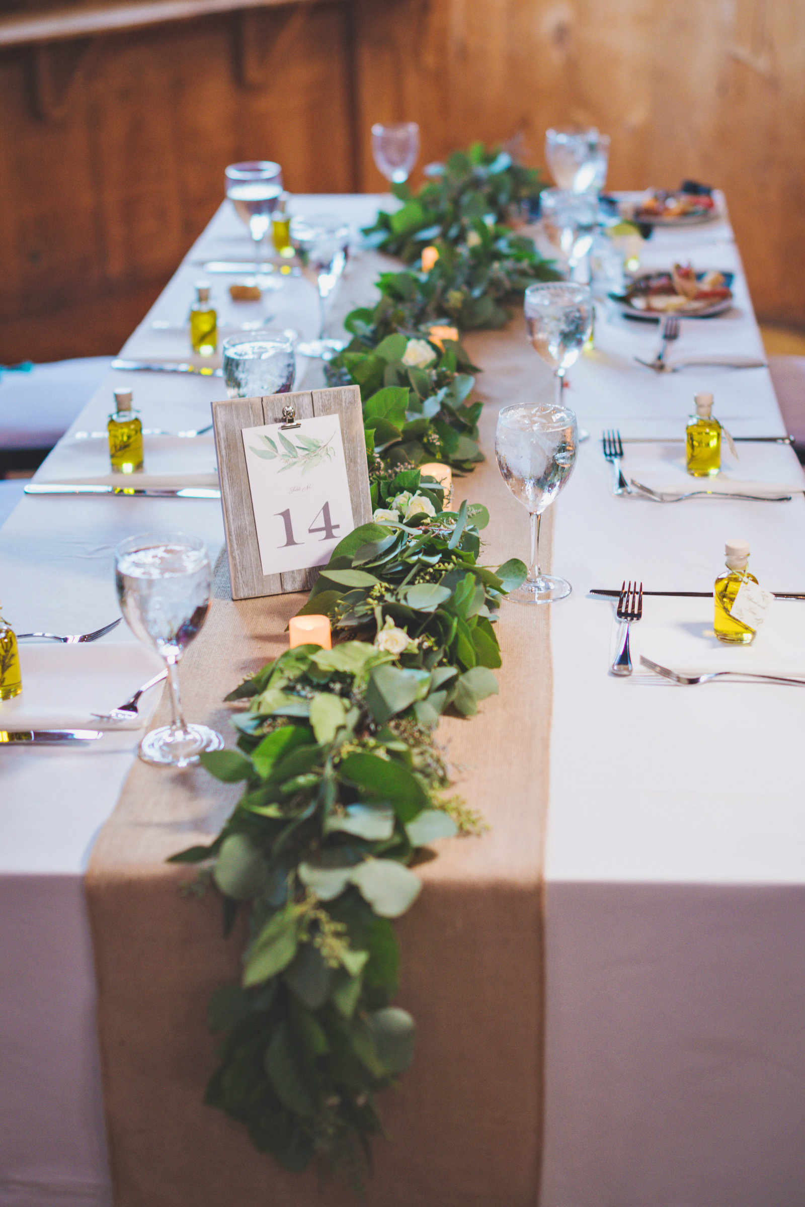 table arrangement, centerpiece, at wedding at The Barn at Old Bethpage