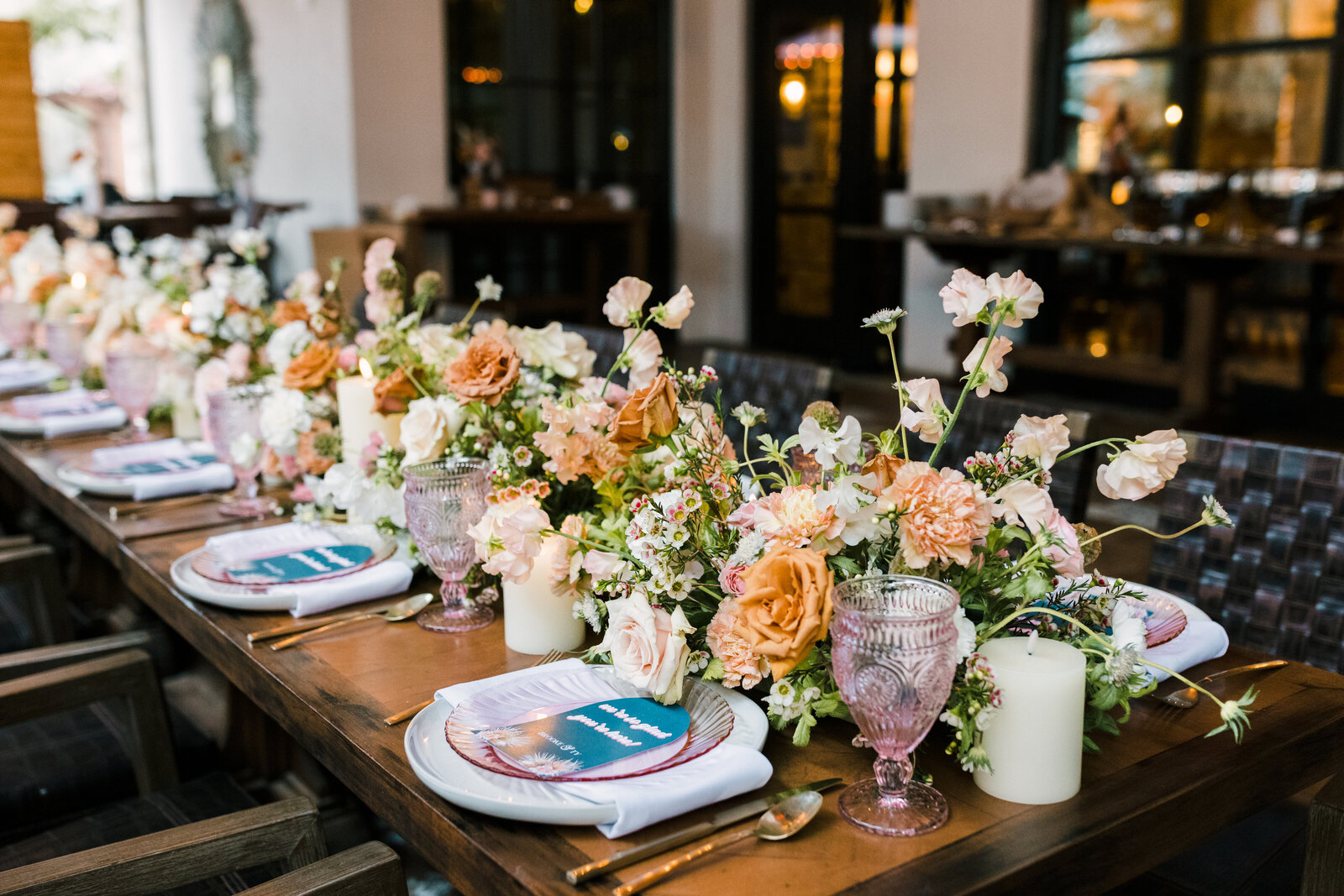 Soft, romantic floral design featuring pink and lilac tones. Designed to elevate a spring wedding tablescape in Dallas.