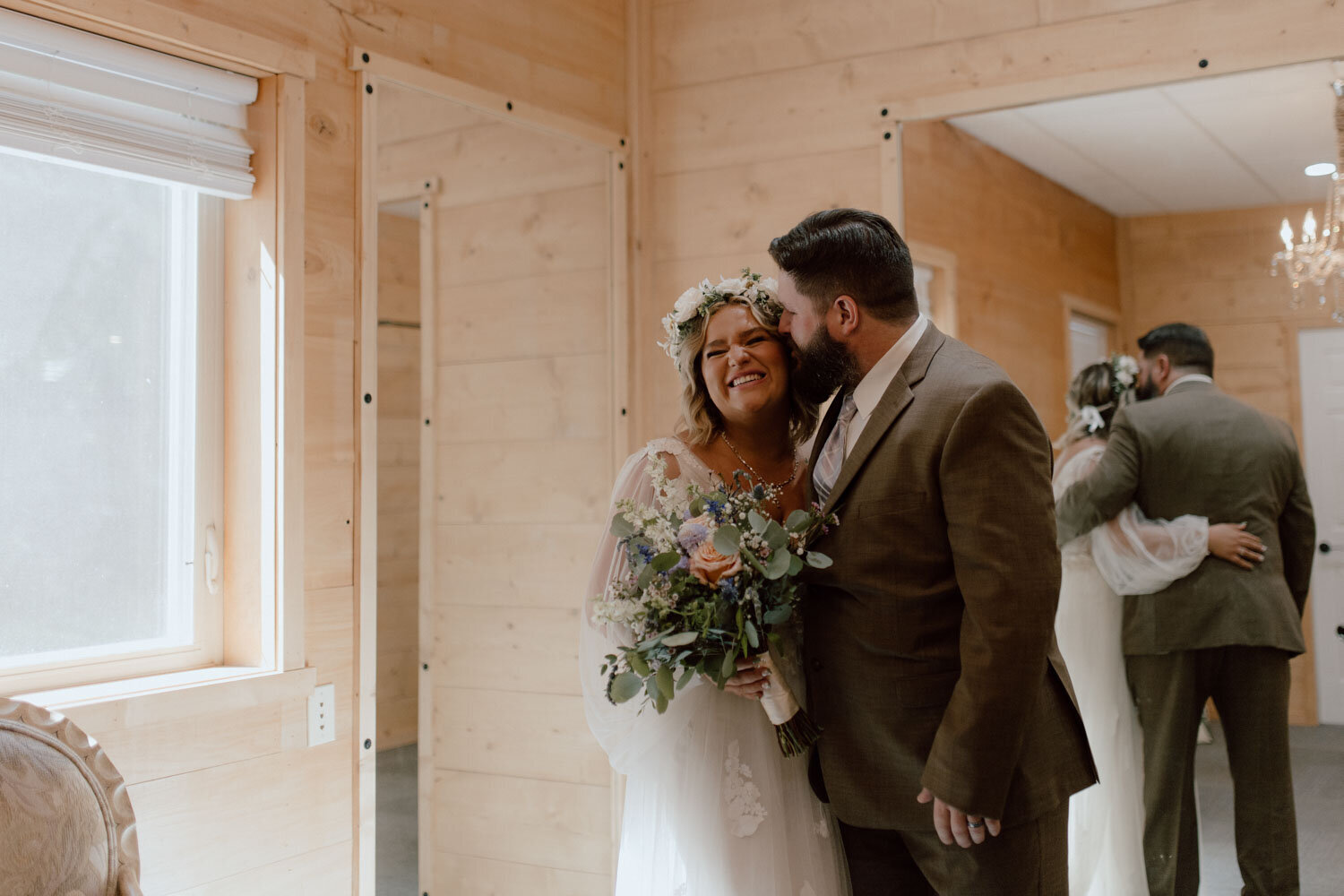 Groom kissing his bride