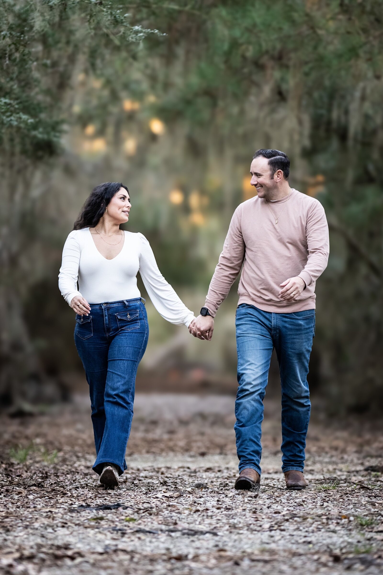 Couple walking along path at Fontainebleau State Park