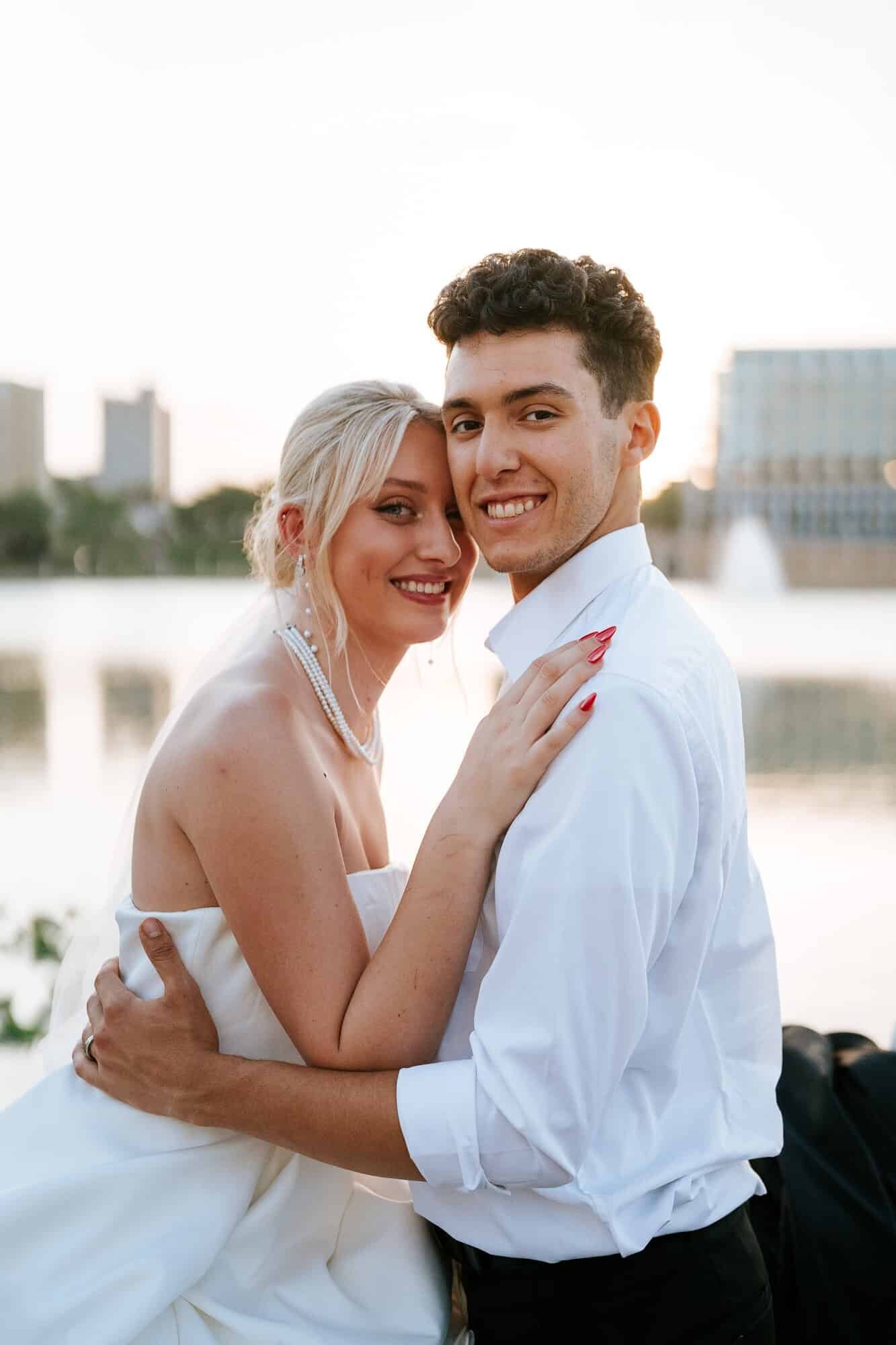 Golden hour couple portraits at Lake Mirror - Magnolia Building Wedding