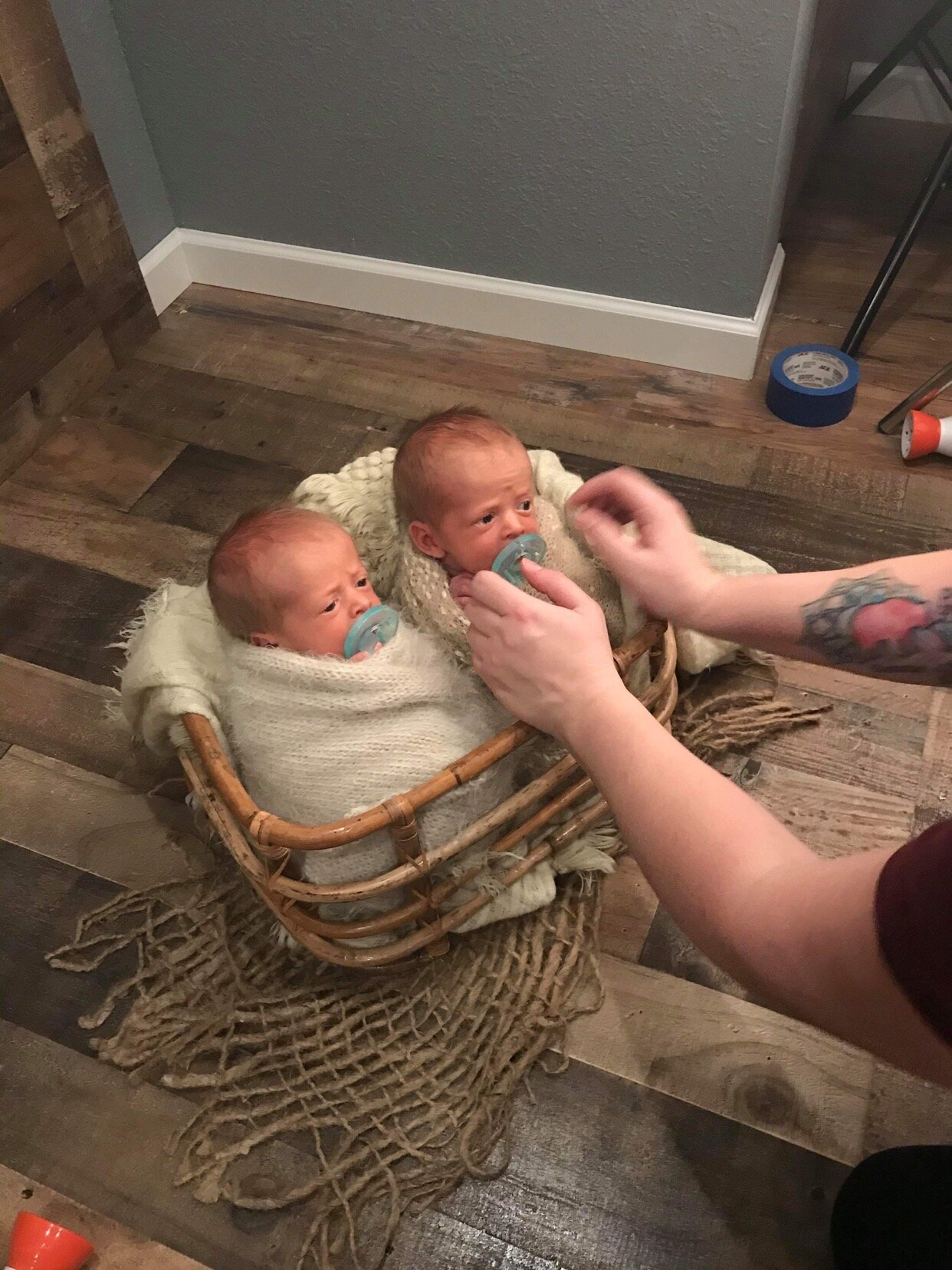 twins in basket, newborn photographer posing