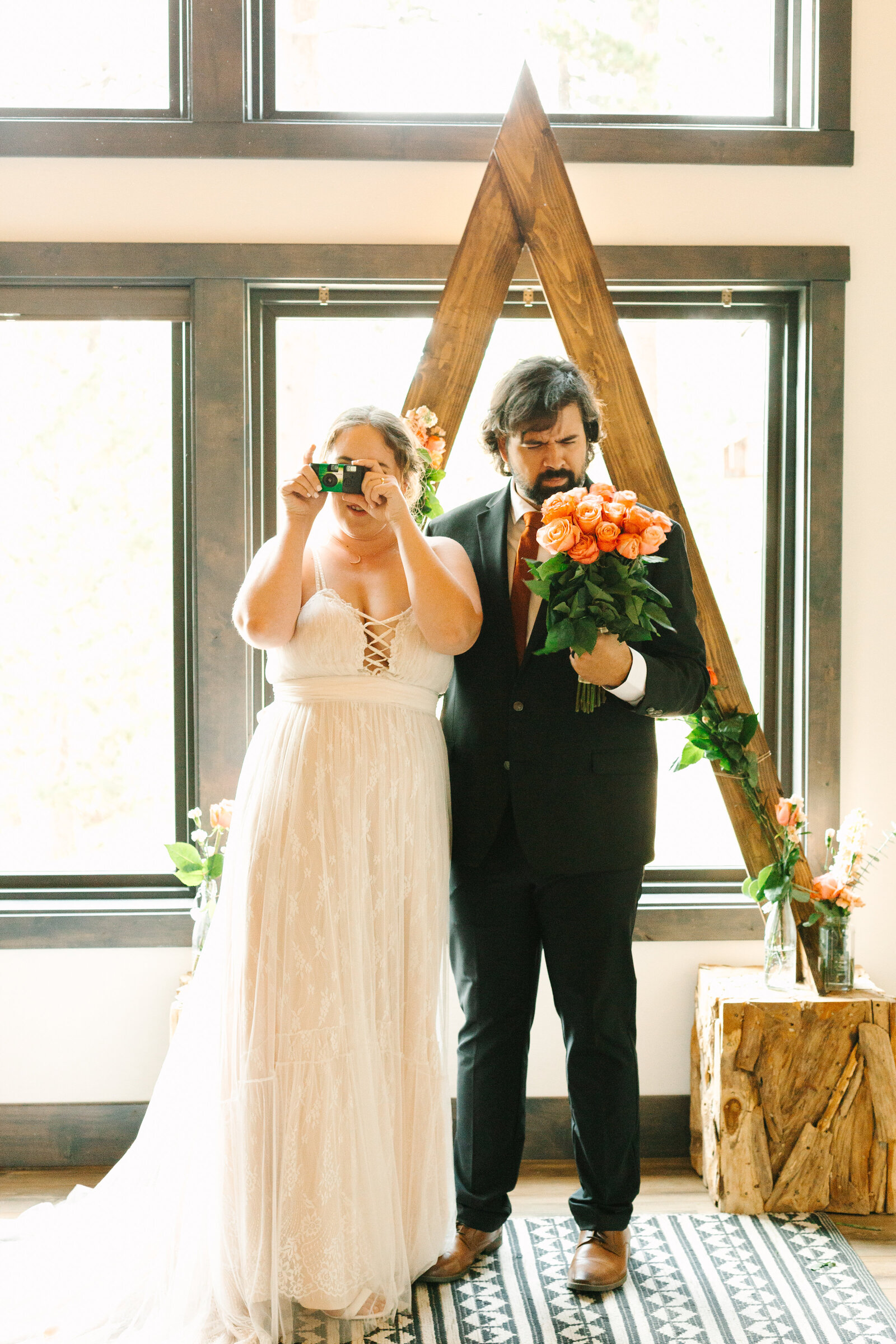 A couple celebrates their intimate elopement at a cabin at Big Bear Lake, California.