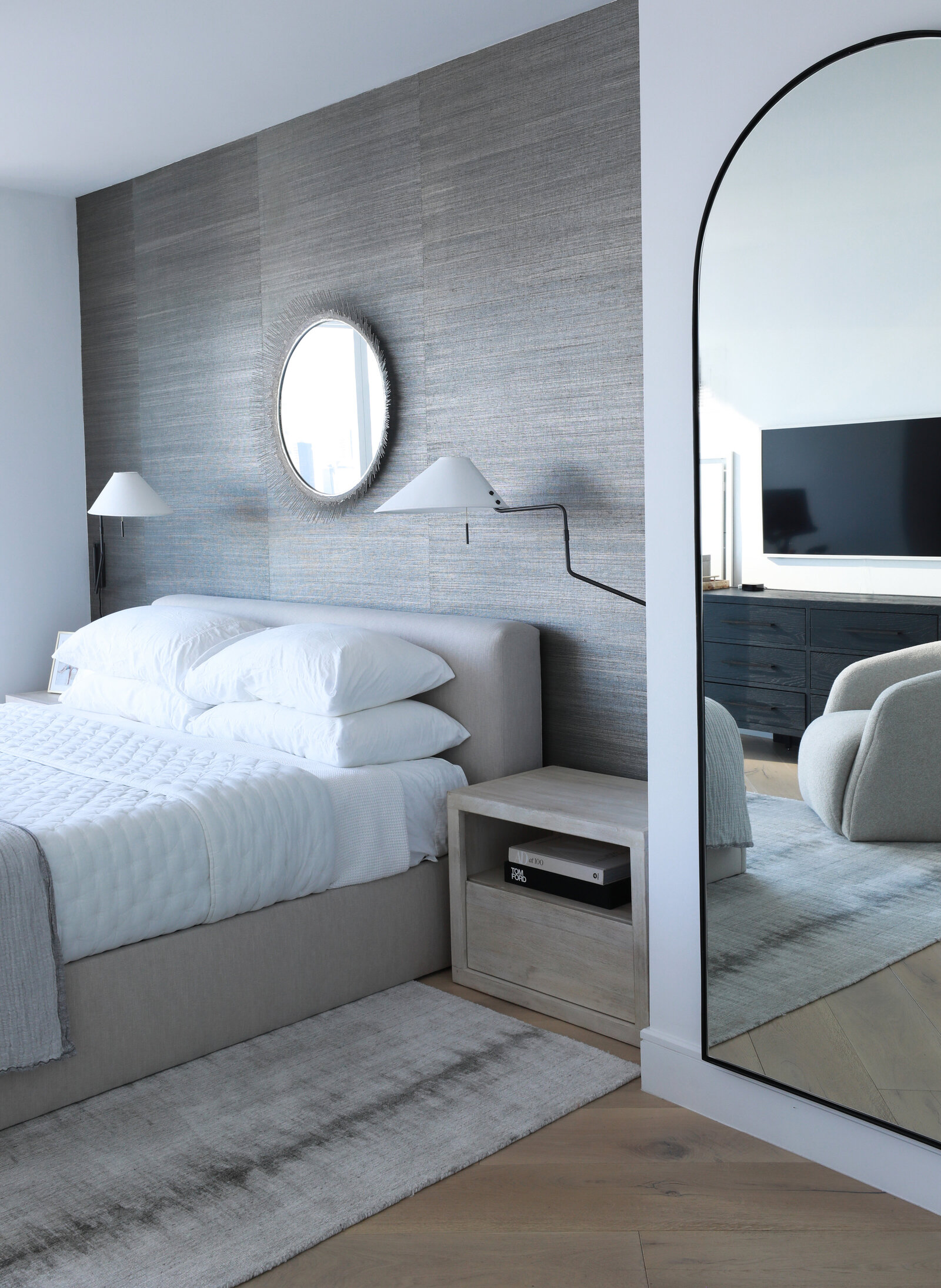 LUXE MODERN PRIMARY BEDROOM WITH GRASCLOTH AND UPHOLSTERED BED