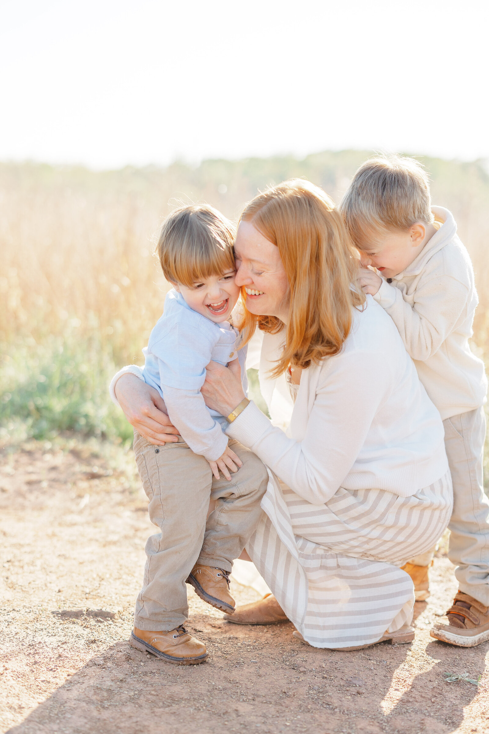 kids laughing with mom during family session in Warrenton, VA
