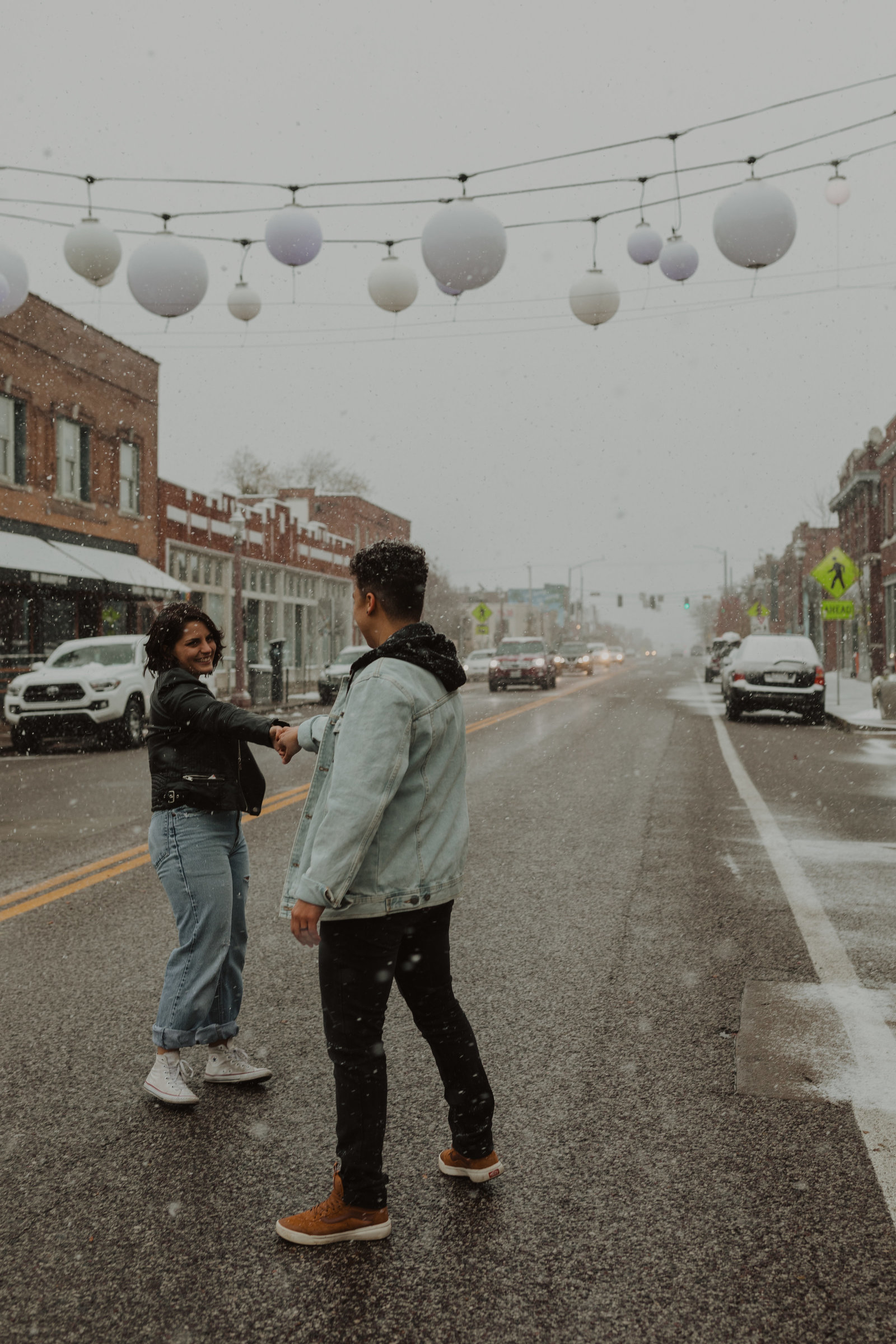 Snowfall during engagement session in STL