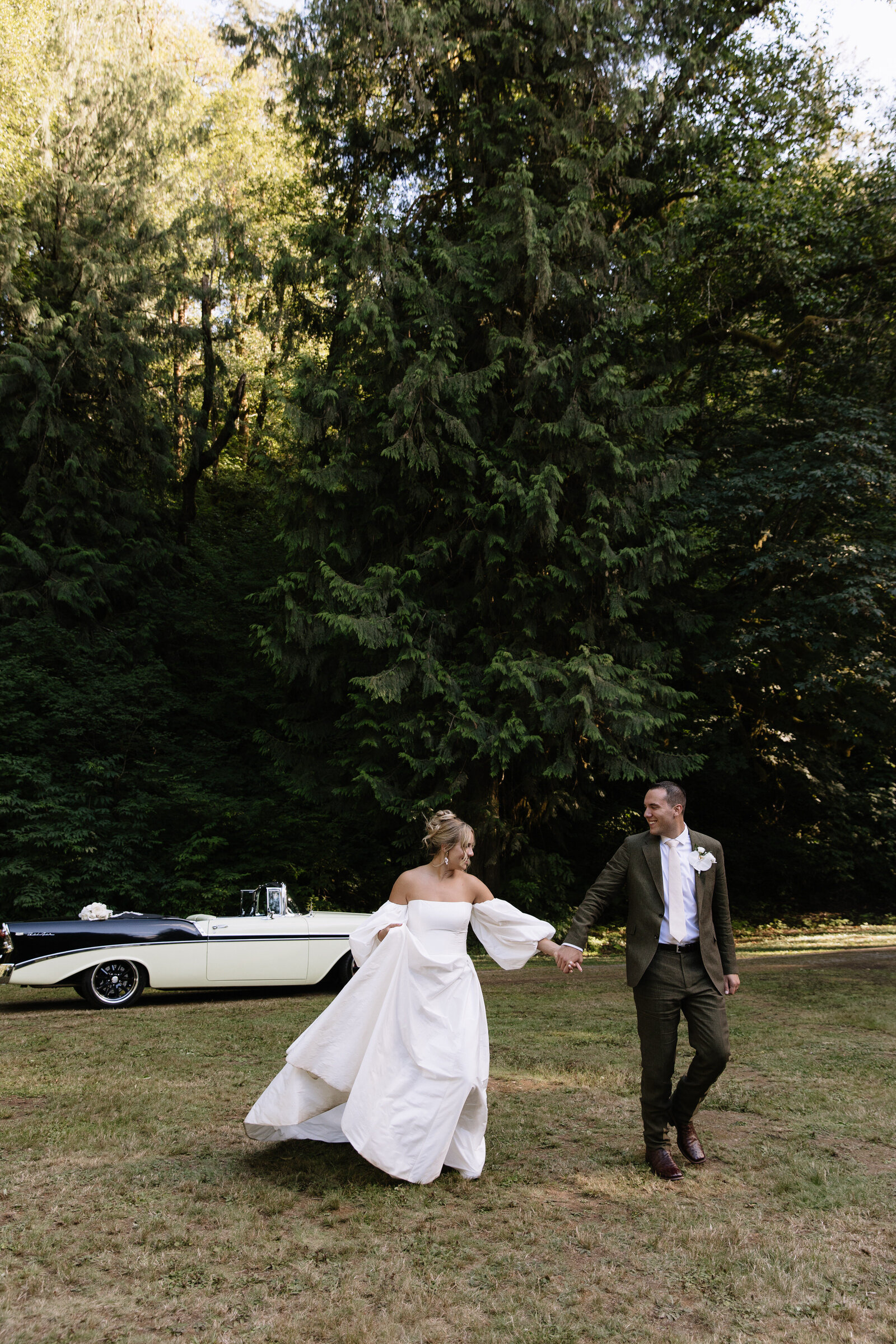 Bride and groom run from classic car for bridal portraits in Vancouver, WA