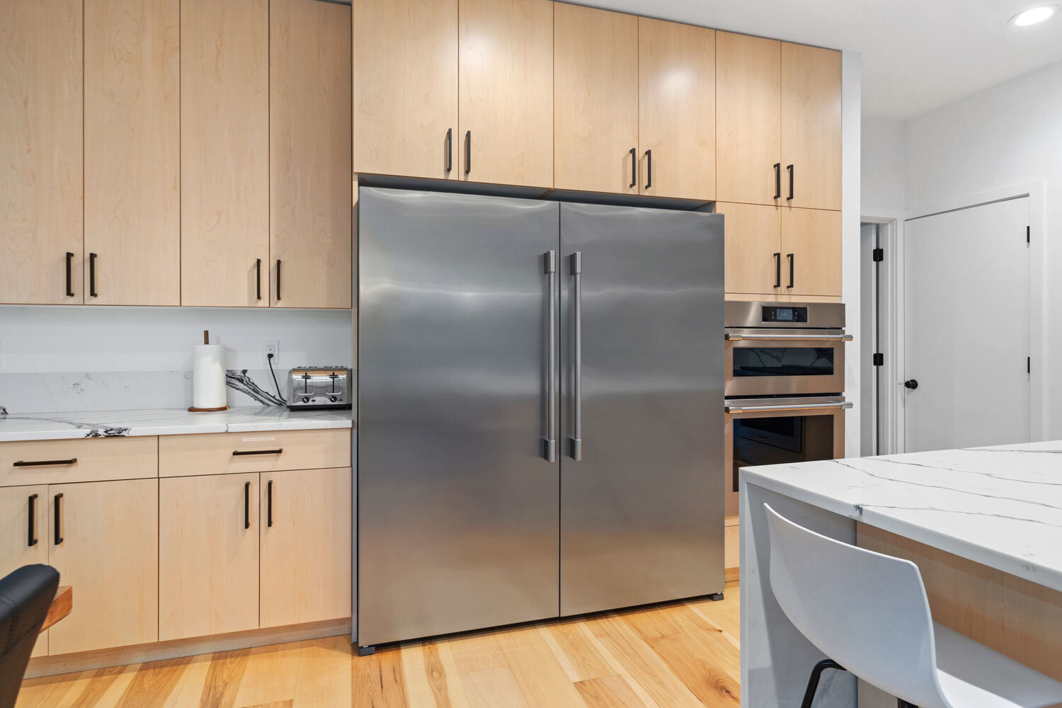 Kitchen area with big fridge
