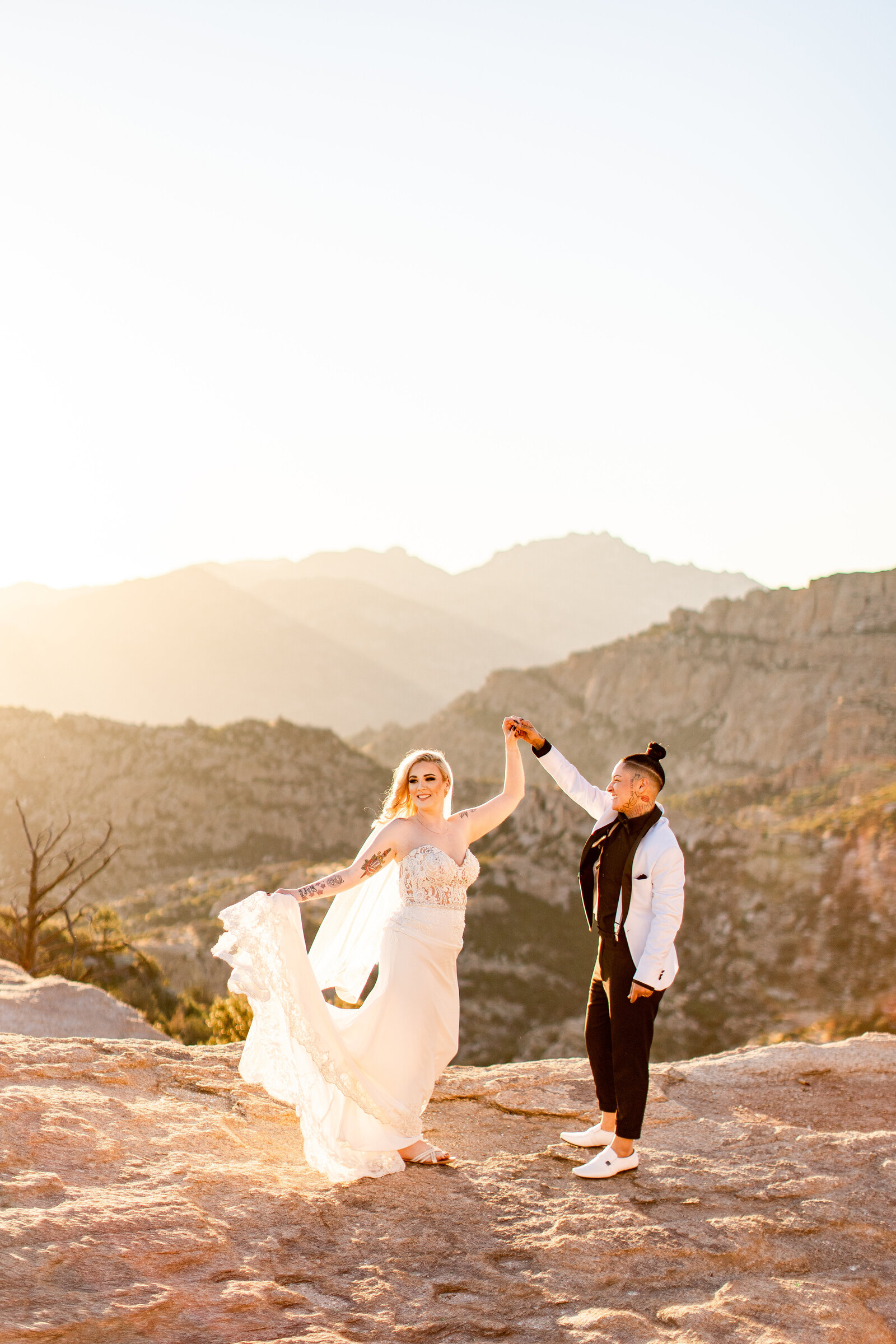 Mount Lemmon elopement photo shoot wedding couple standing on mountains