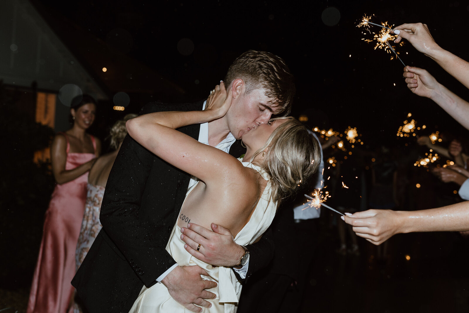 kissing sparkler exit wedding