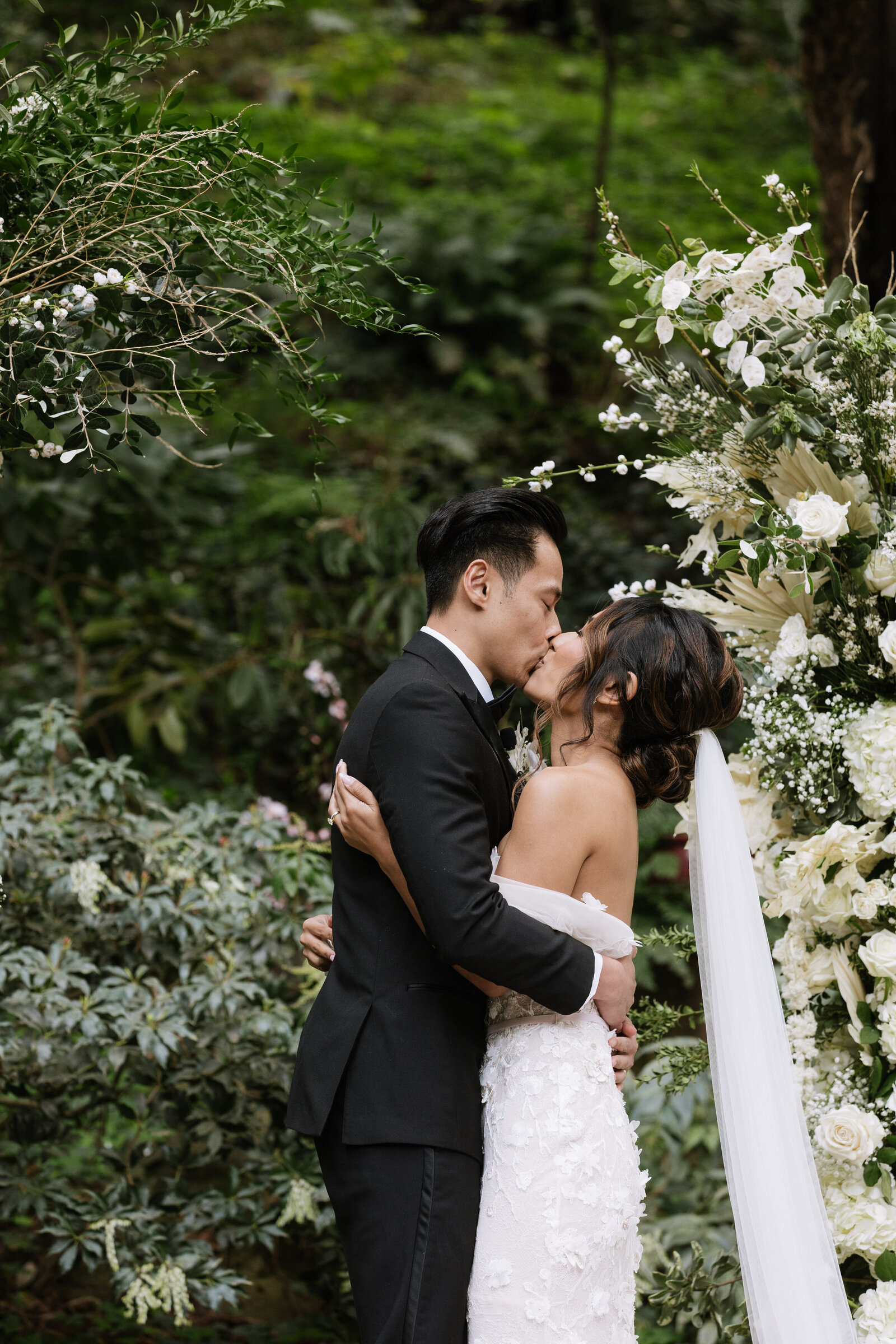 Private redwood ceremony with florals in Washington elopement