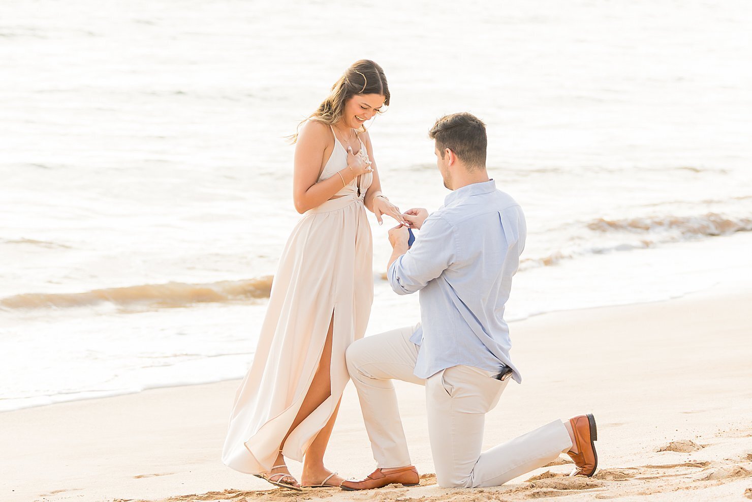 Hawaii proposal with man down on one knee