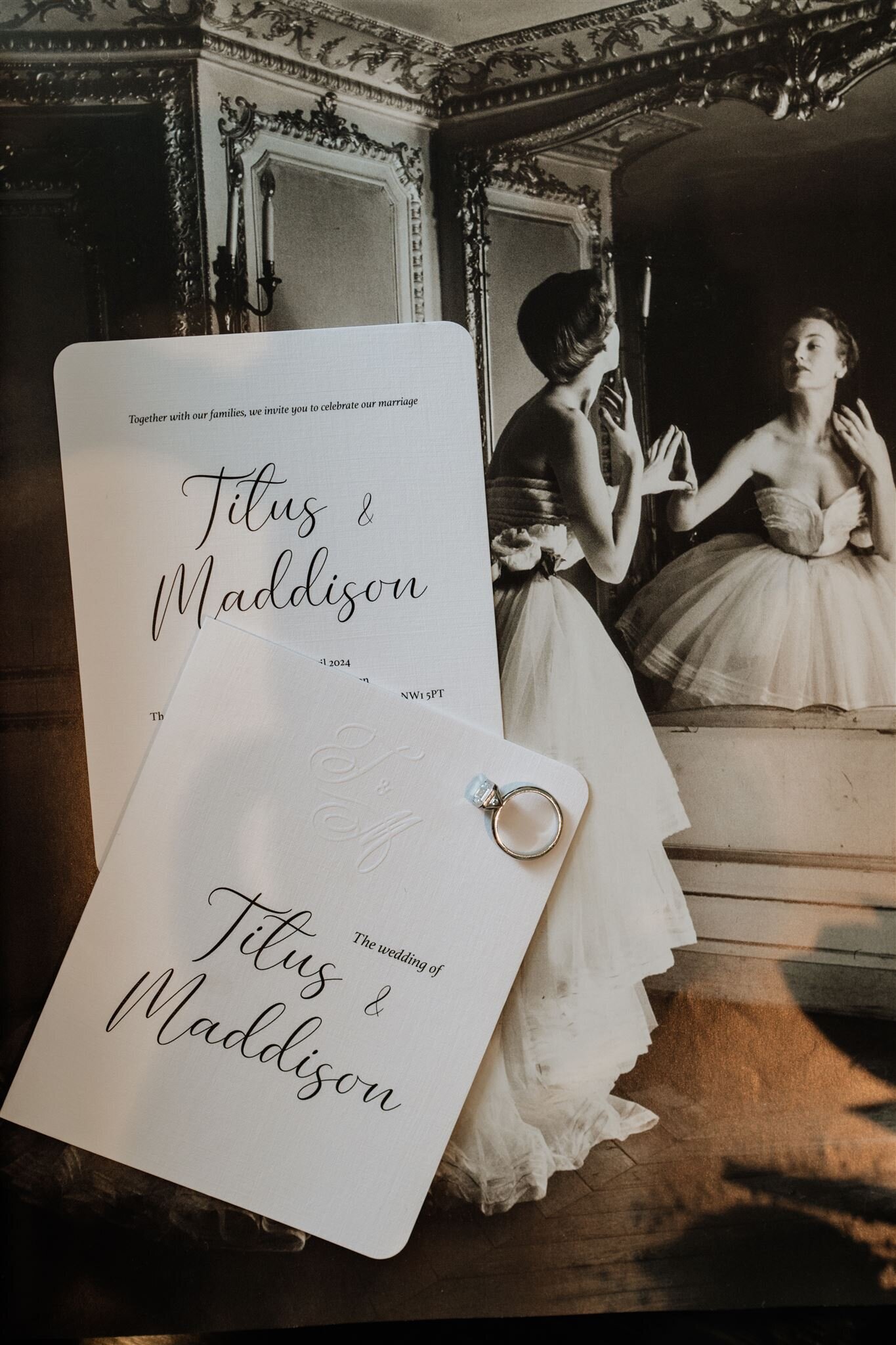 Detail photo of wedding stationery and engagement ring at a London hotel