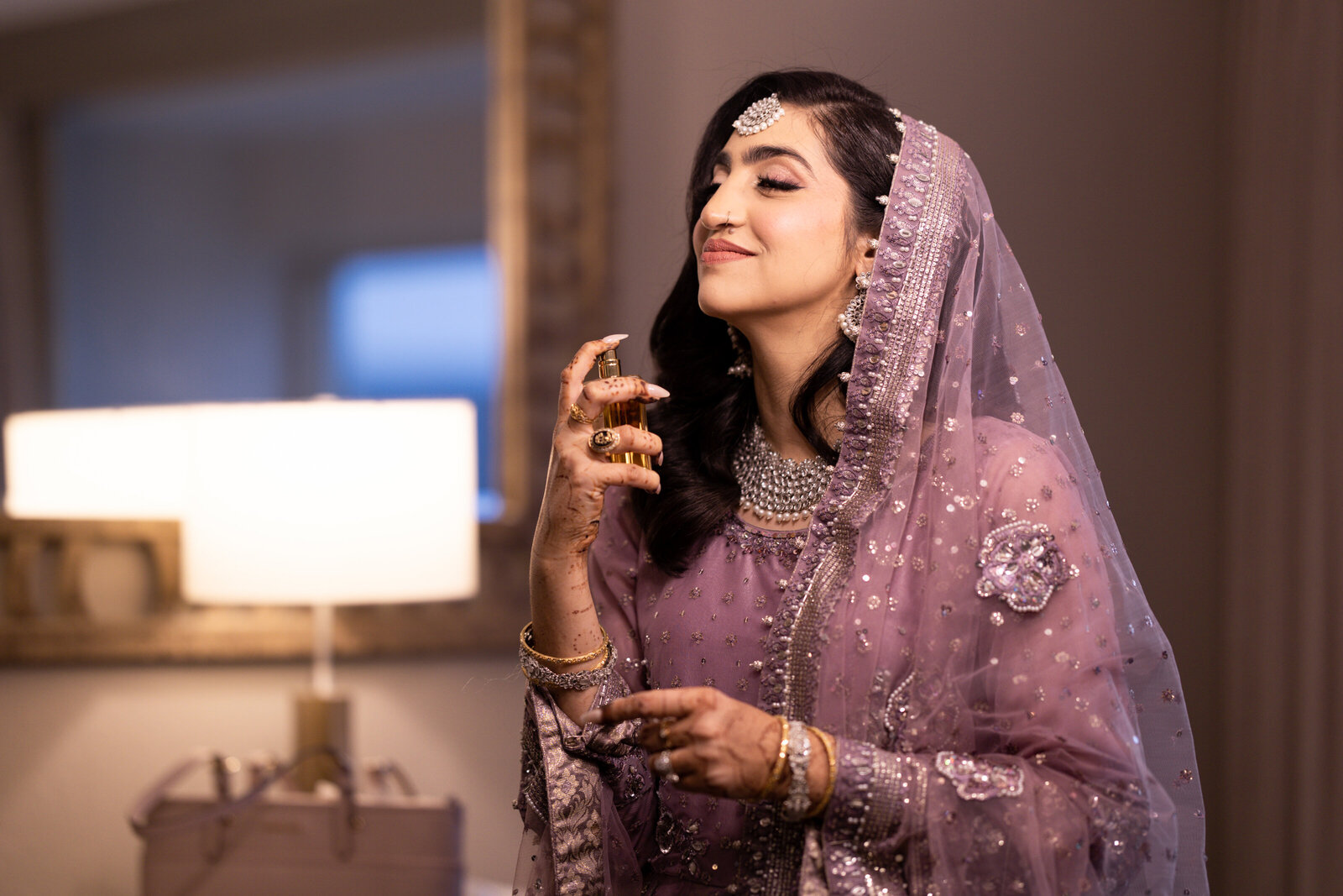 Bride-spraying-on-perfume