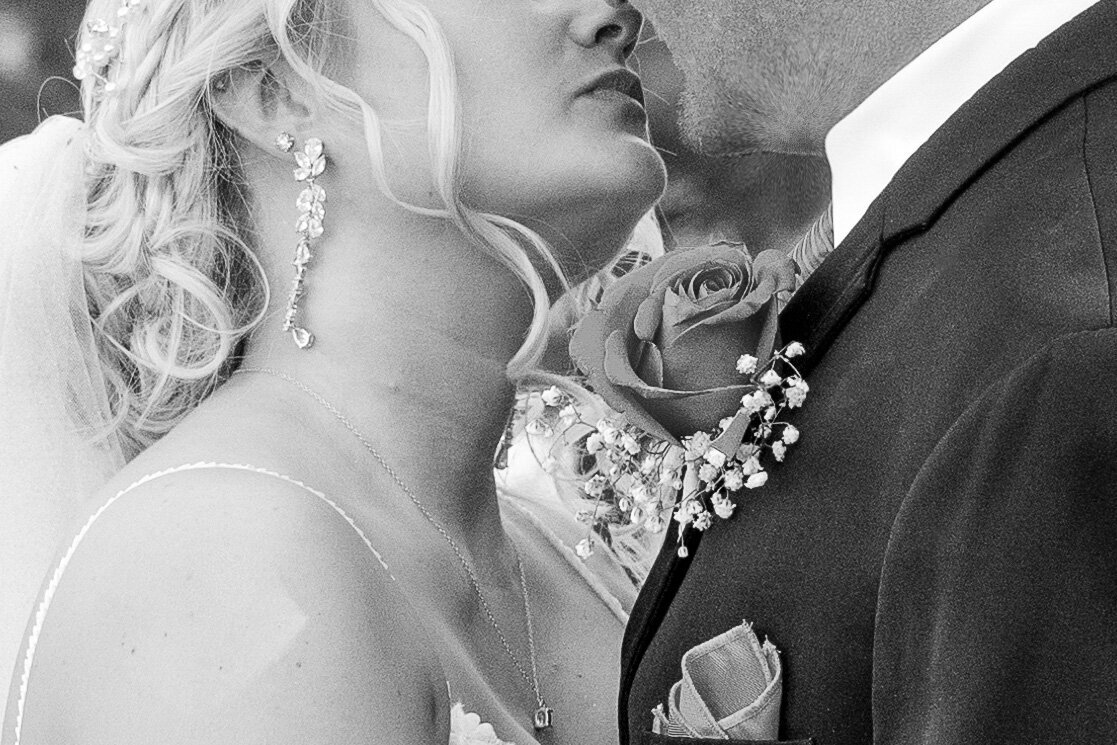 bride and groom closeup of mouths about to kiss