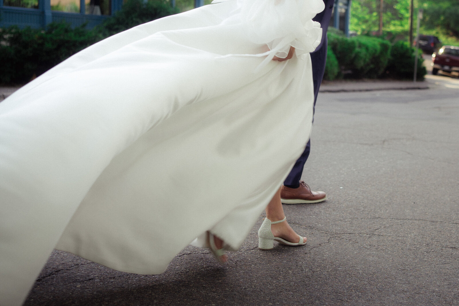 best Virginia wedding photographer captures movement of bride and groom walking