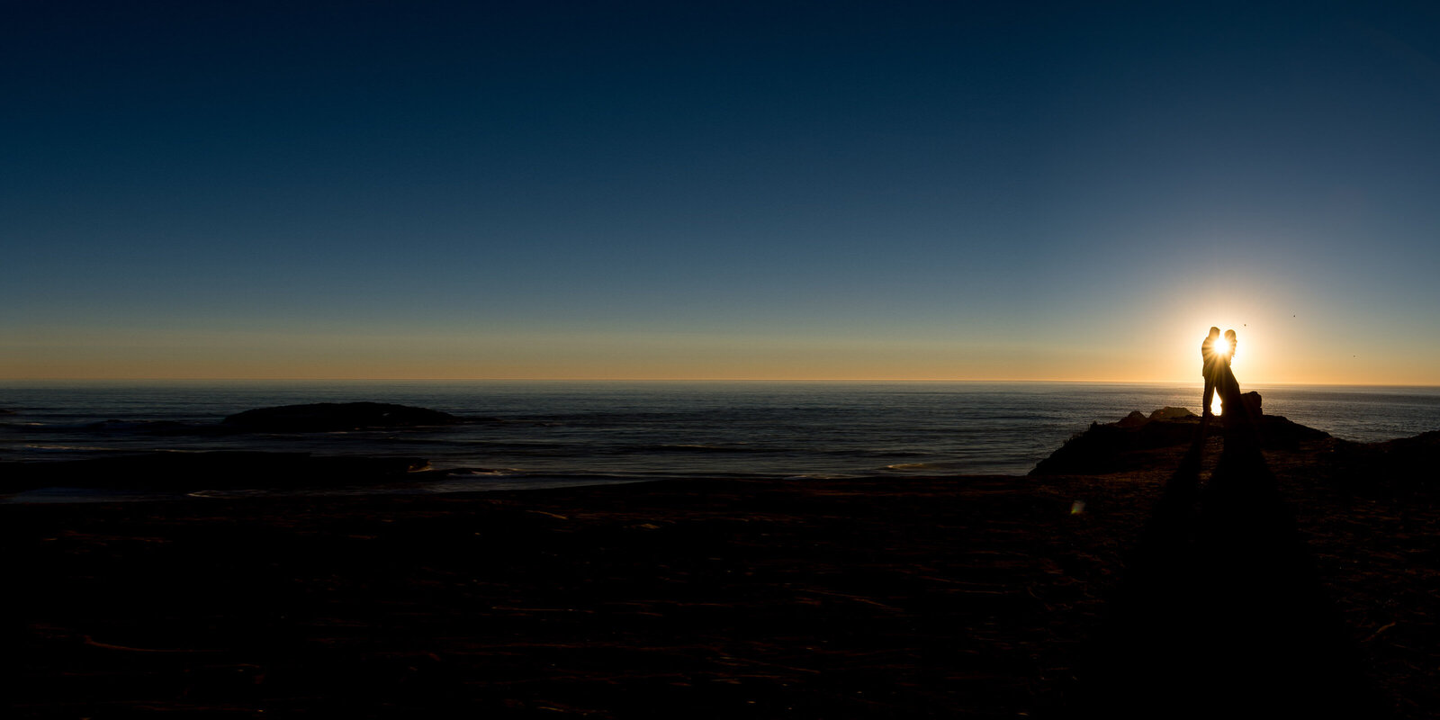 bride-groom-ocean-sunset-epic-dark-