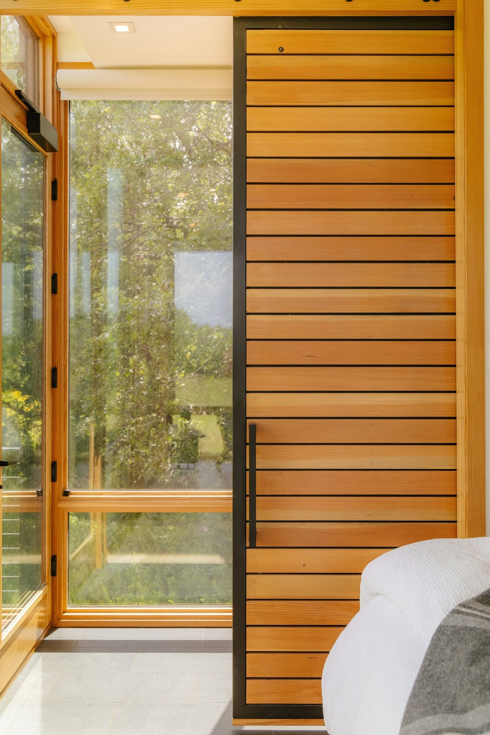 wooden panel and bed with windows to show home remodeling atlanta by Varilko remodeling