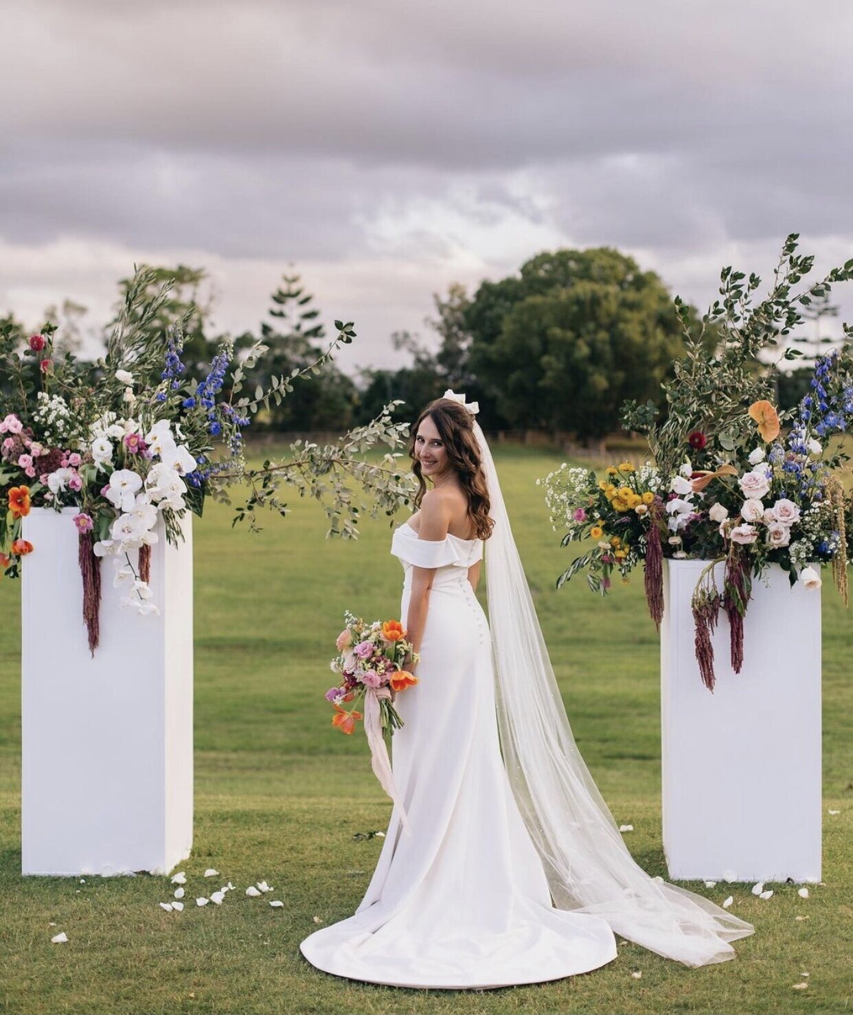 Bella Rae Bride Harriet looking Beautiful Natural Glam with her  soft wavy upstyle and natural glam makeup at Husk Distillery captured by Figtree Pictures
